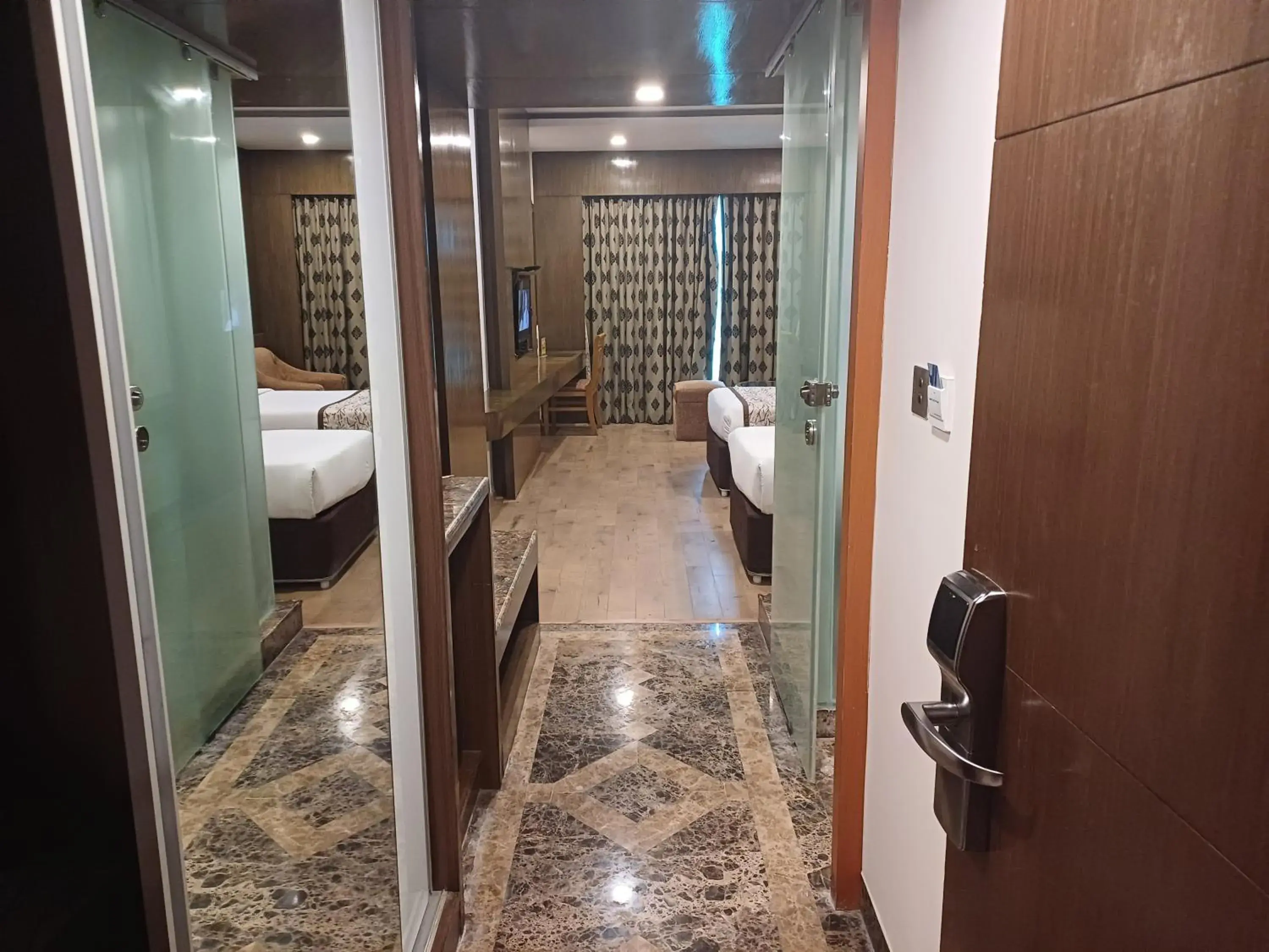 wardrobe, Bed in Hotel Benzz Park Chennai wardrobe, Bed in Hotel Benzz Park Chennai