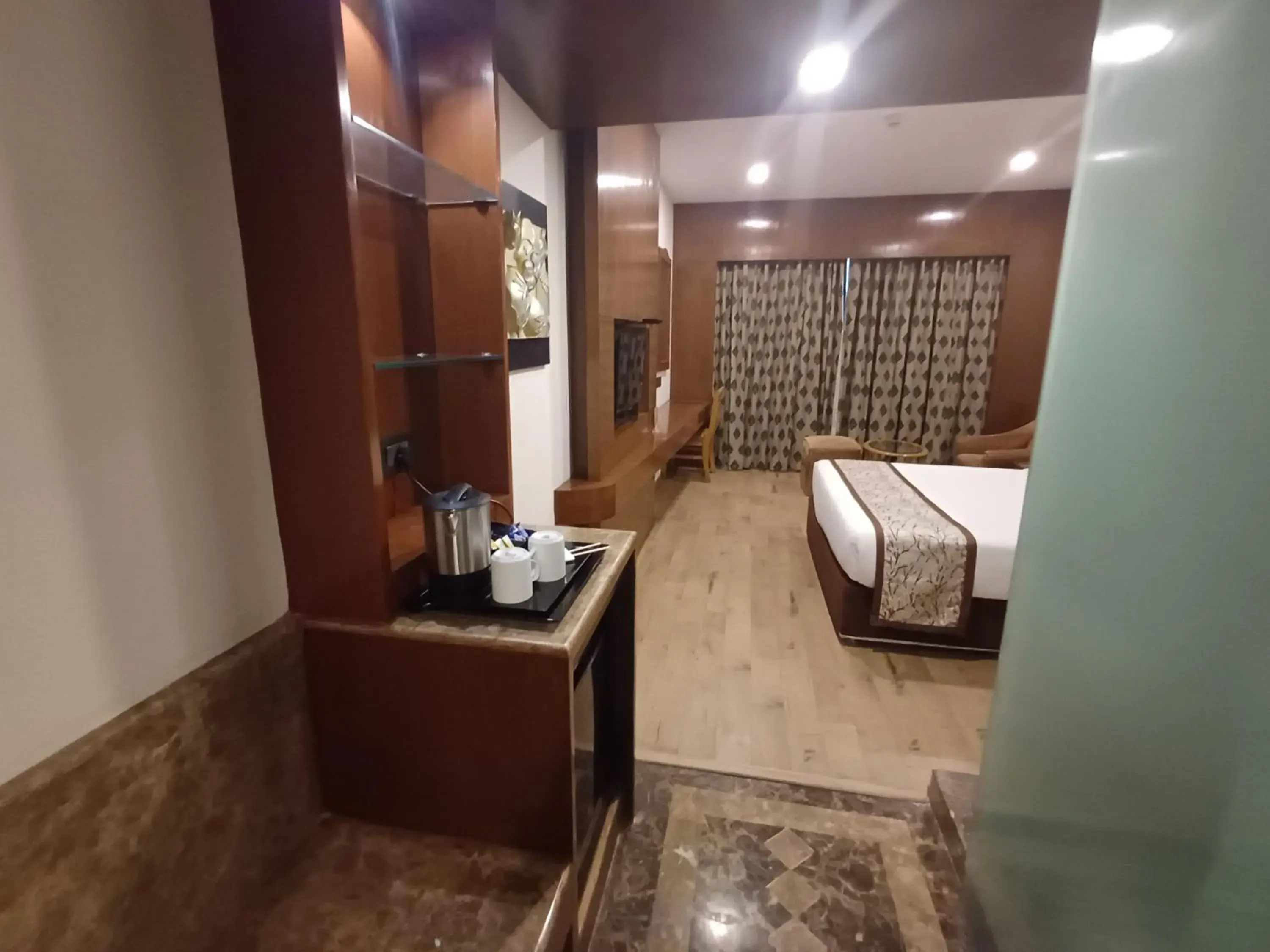 Bedroom, Bed in Hotel Benzz Park Chennai Bedroom, Bed in Hotel Benzz Park Chennai