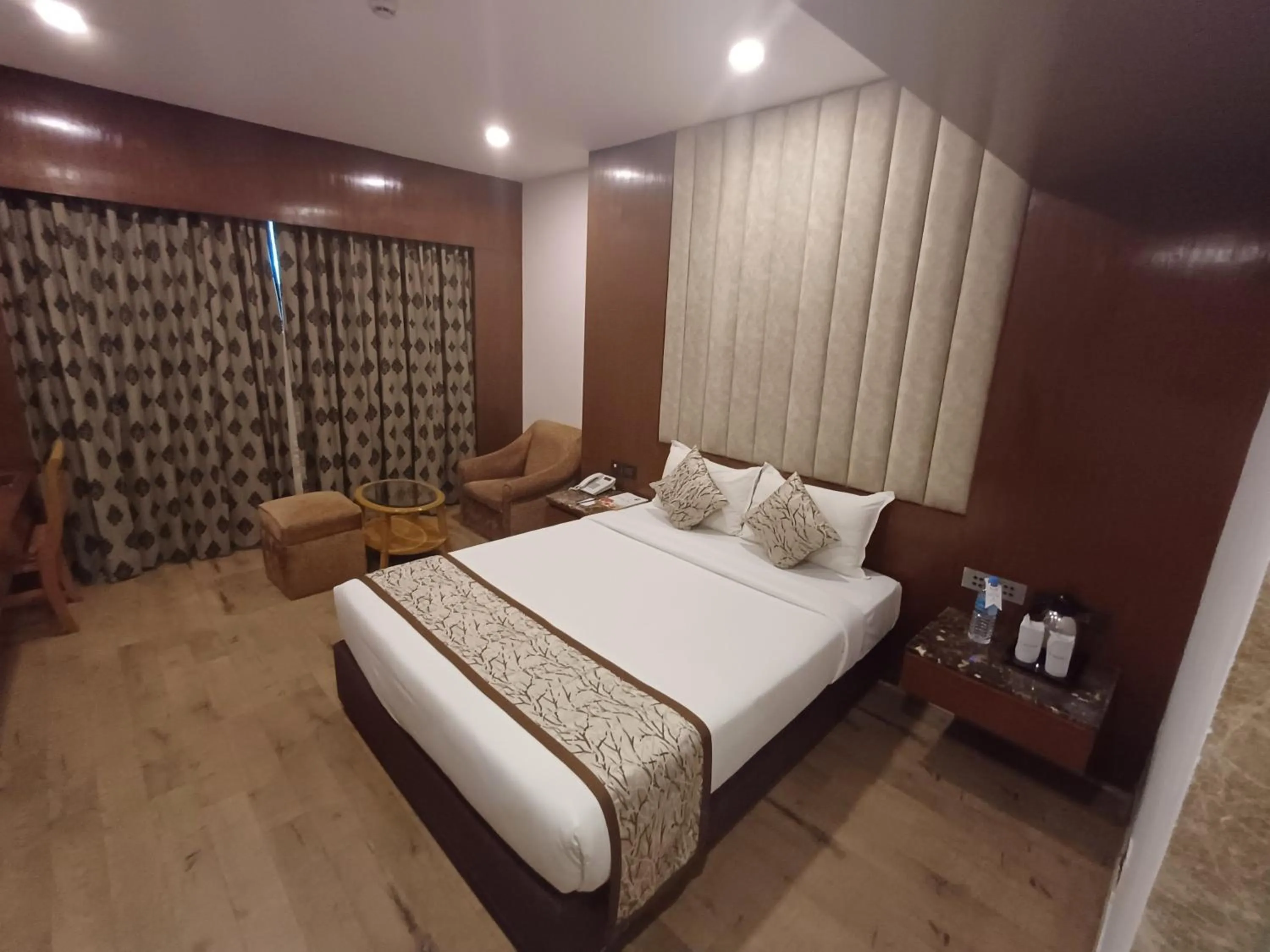 Photo of the whole room, Bed in Hotel Benzz Park Chennai