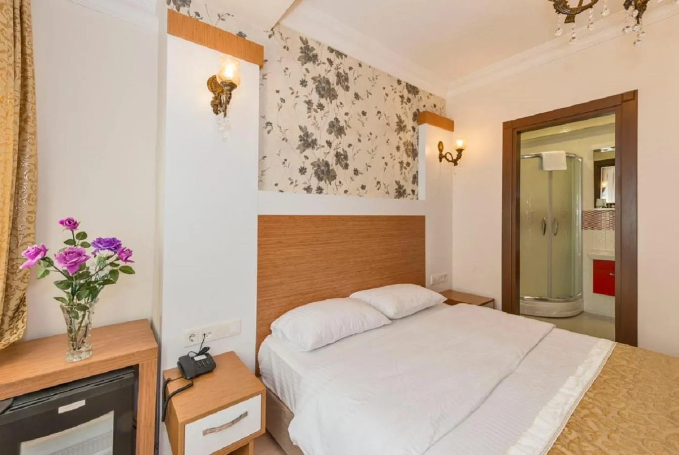 Bed in Raimond Hotel