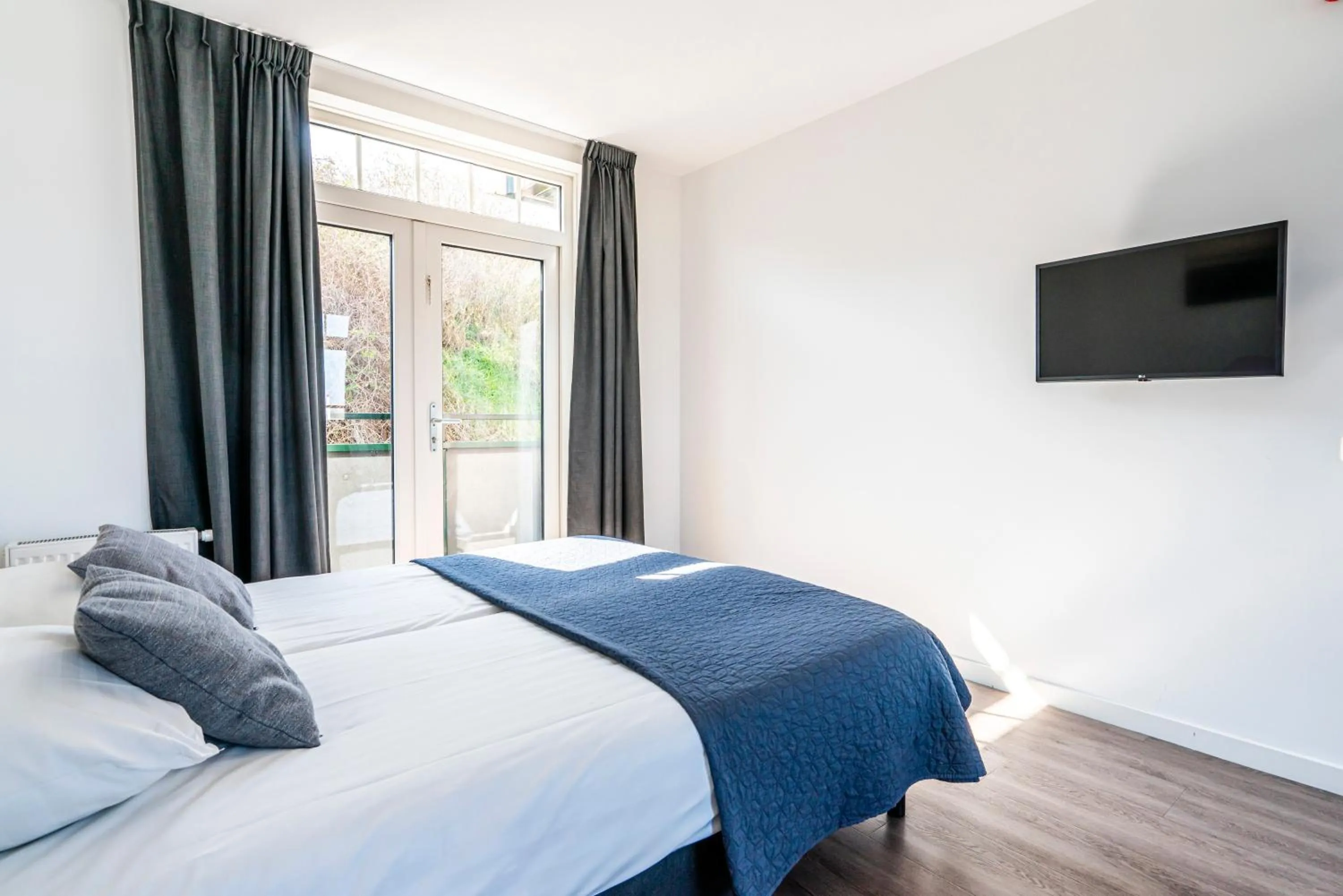 Bed in Duinhotel Haga