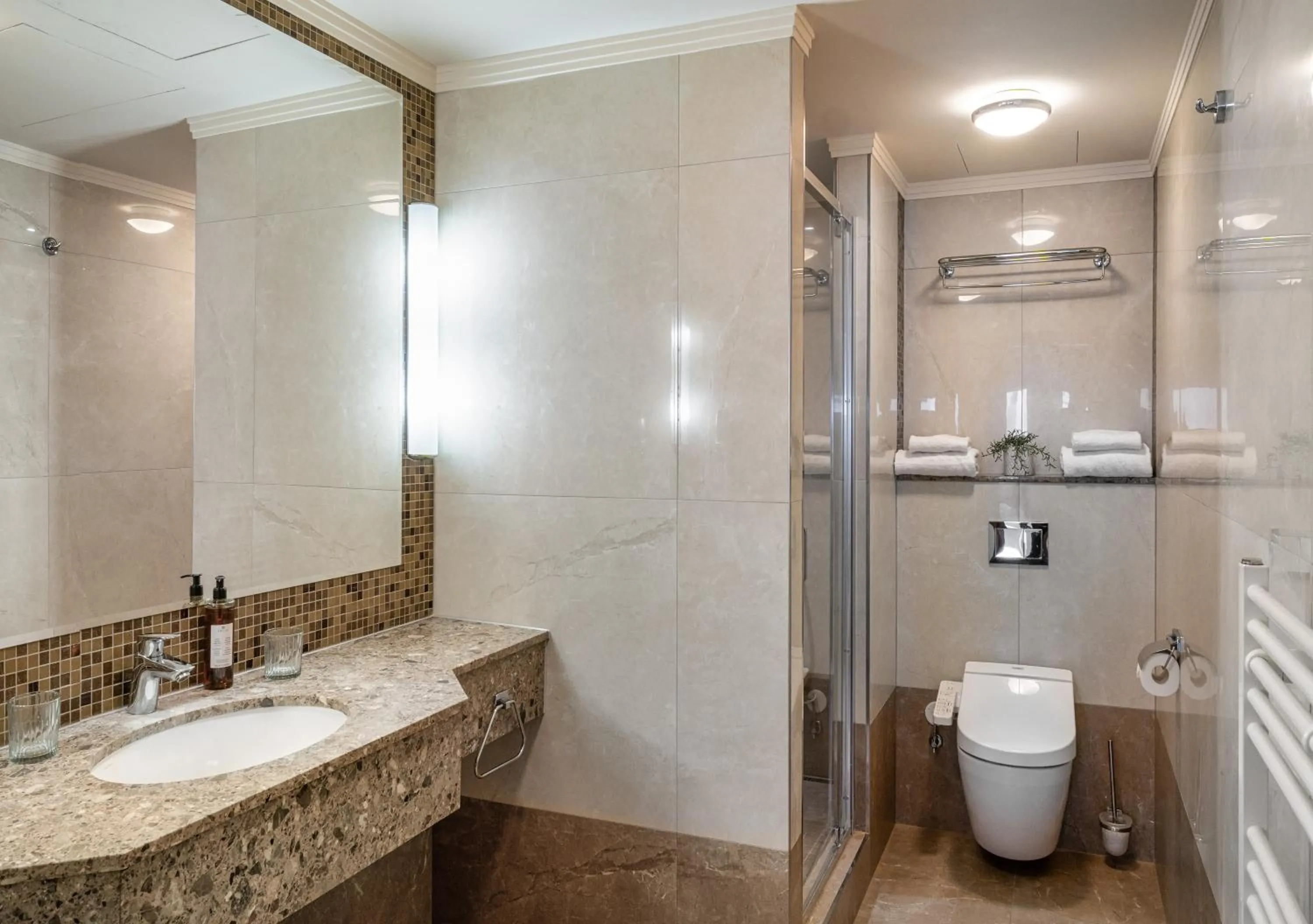 Bathroom in Crown Palace Apartments by Adrez