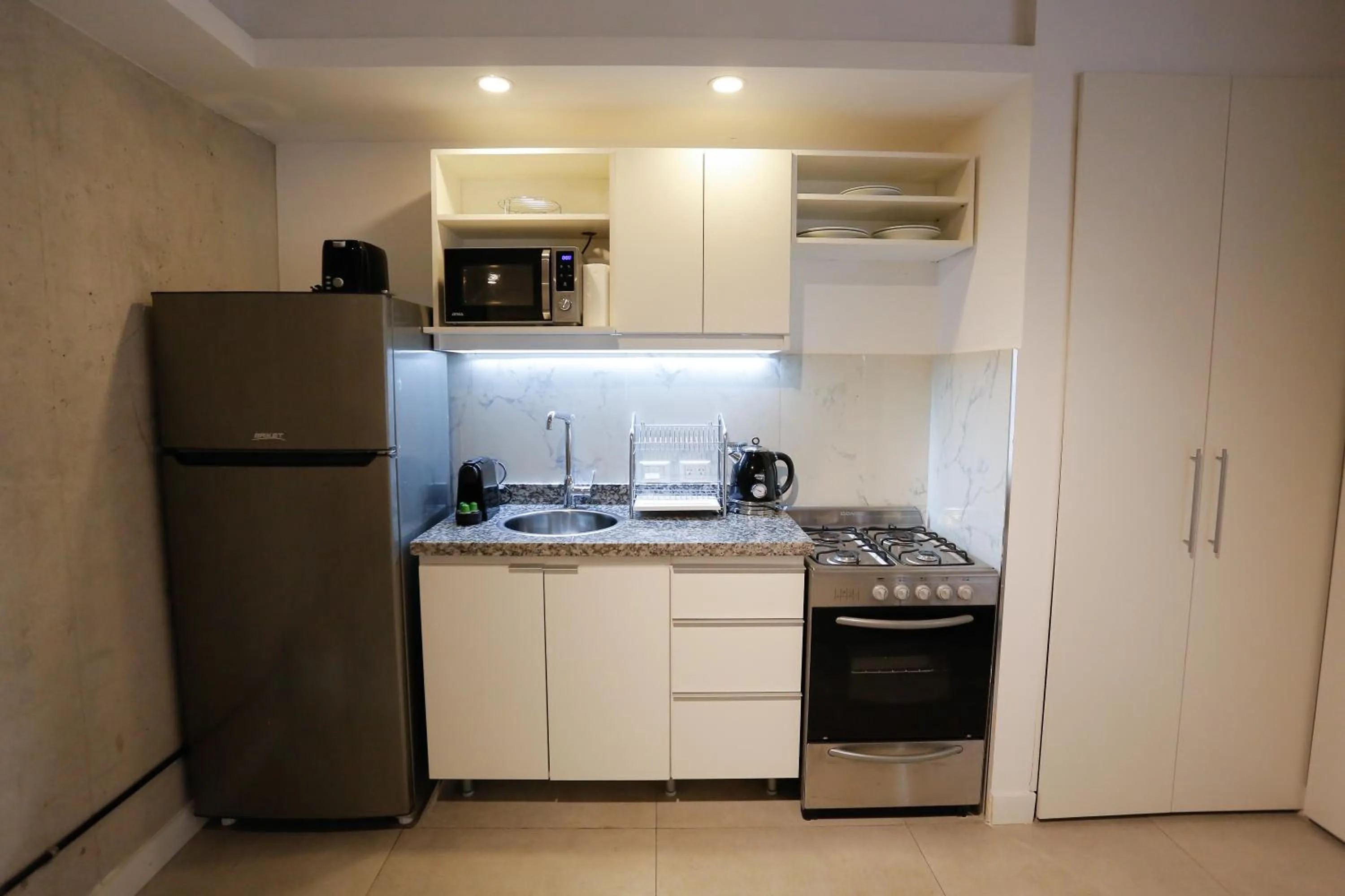 Kitchen or kitchenette in OWN Belgrano Studios & Suites