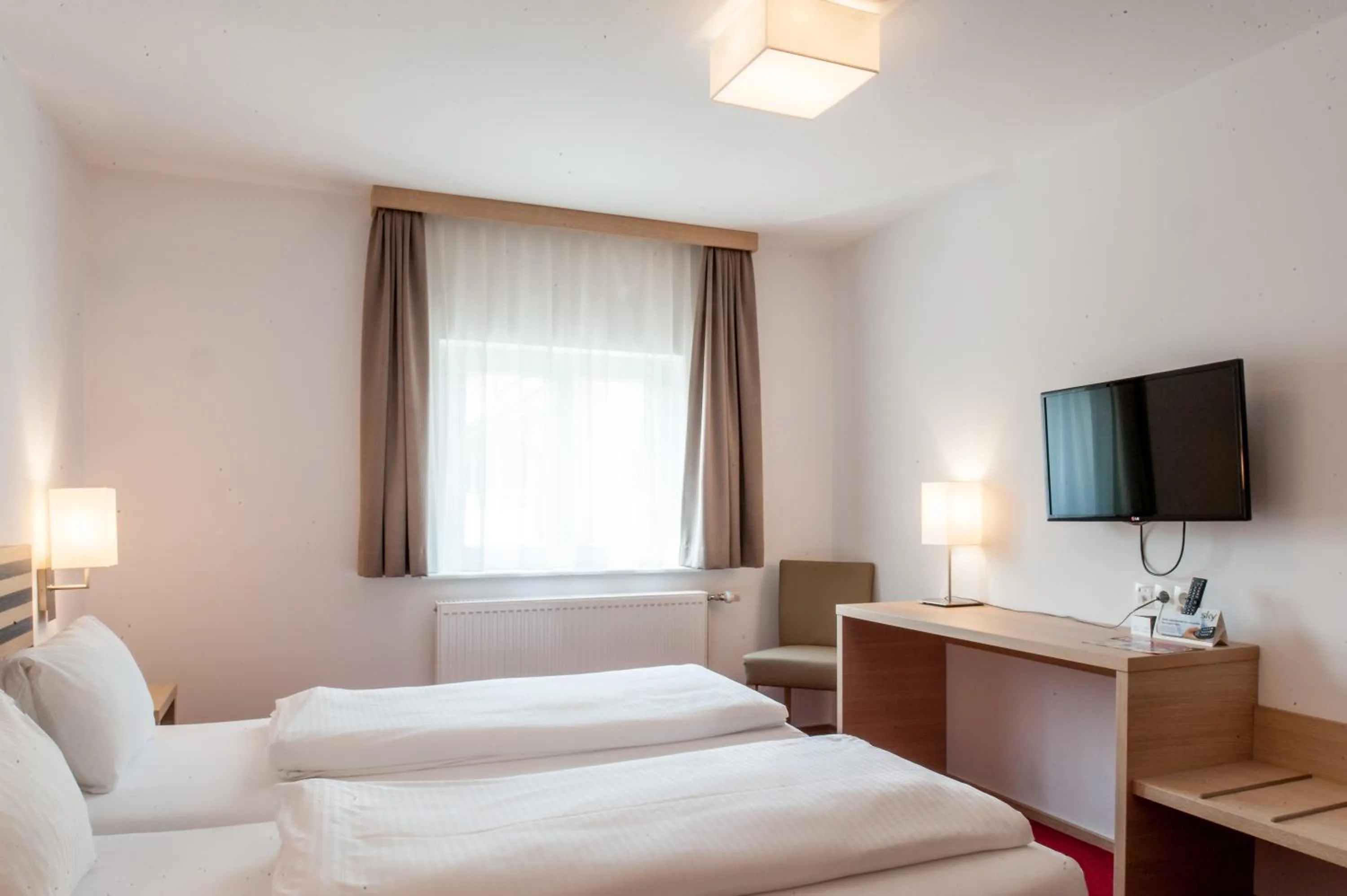 Photo of the whole room, Bed in Gästehaus Brugger