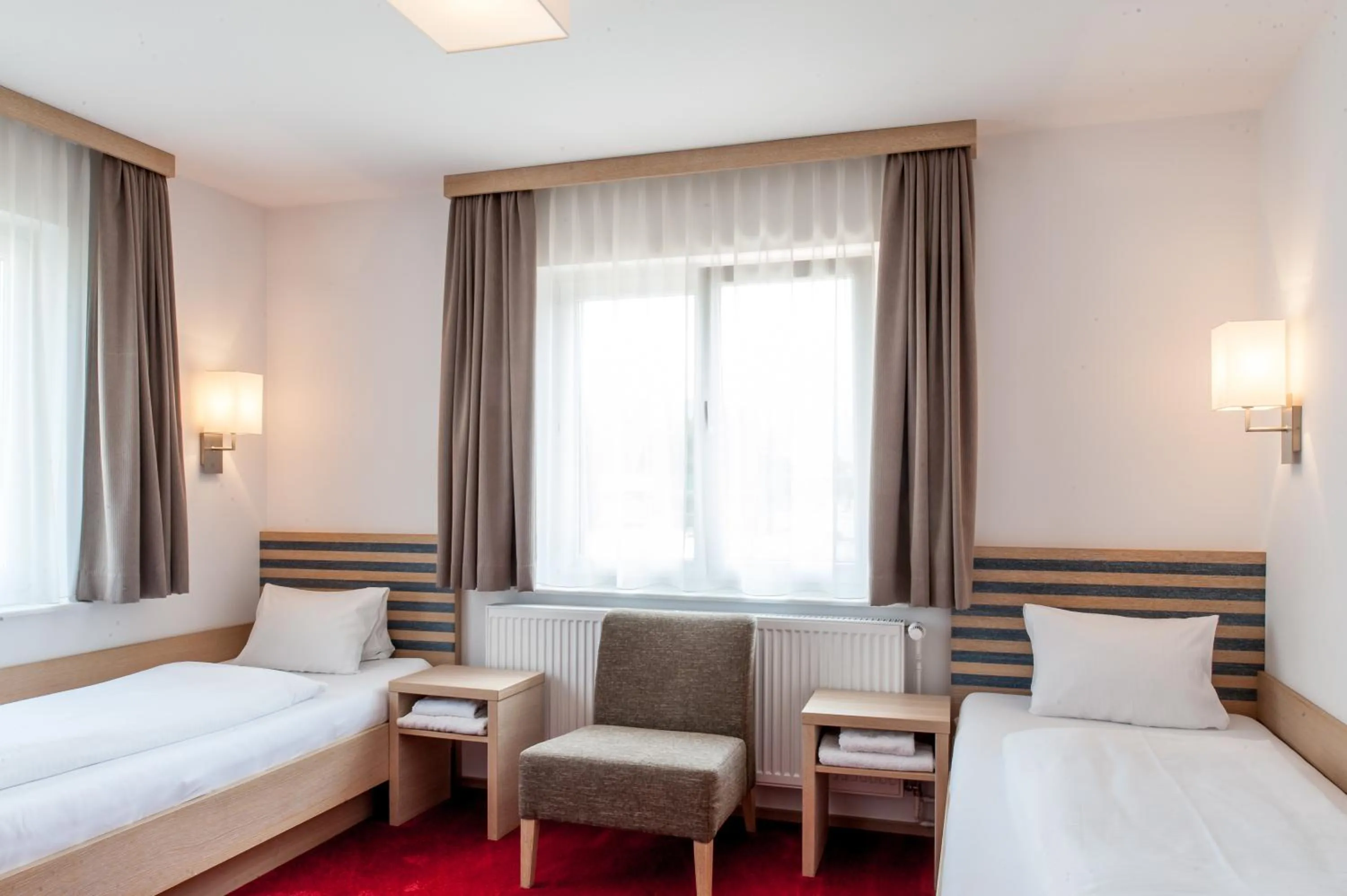 Photo of the whole room, Bed in Gästehaus Brugger