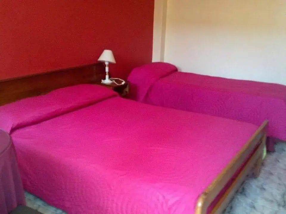 Classic Triple Room in Hostel & Posada Noelia Classic Triple Room in Hostel & Posada Noelia