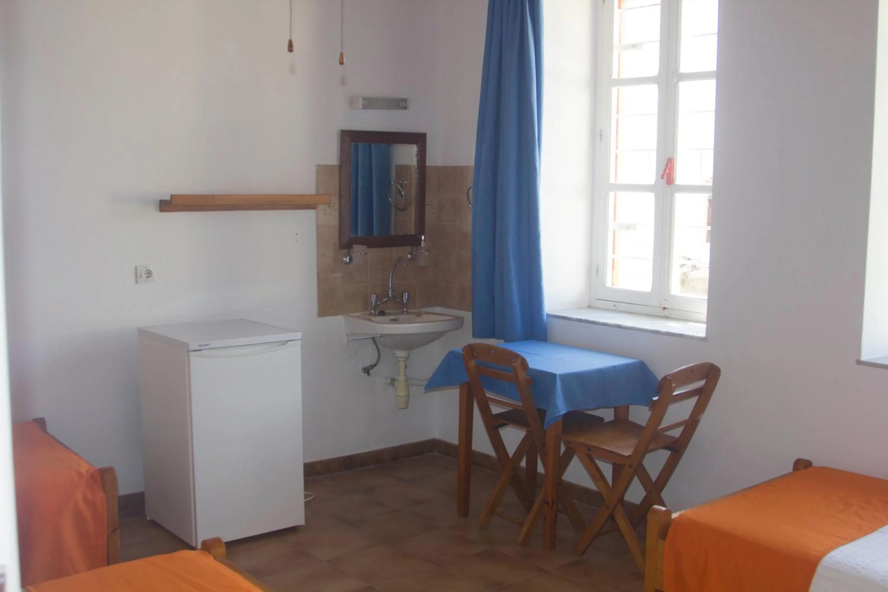 Bed in Medieval Rose Guest House