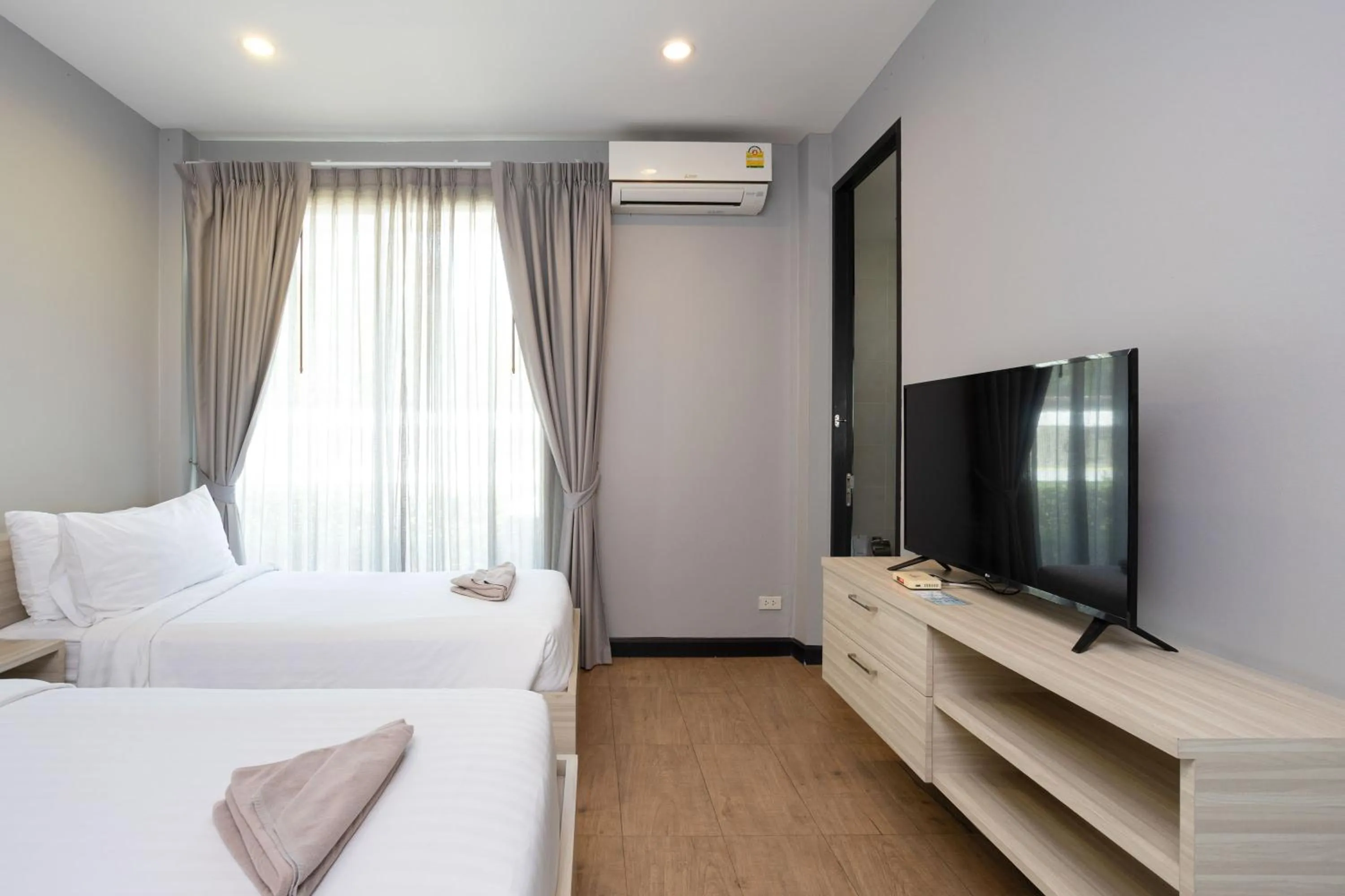 Communal lounge/ TV room, Bed in The Sea-Cret Garden Hua Hin