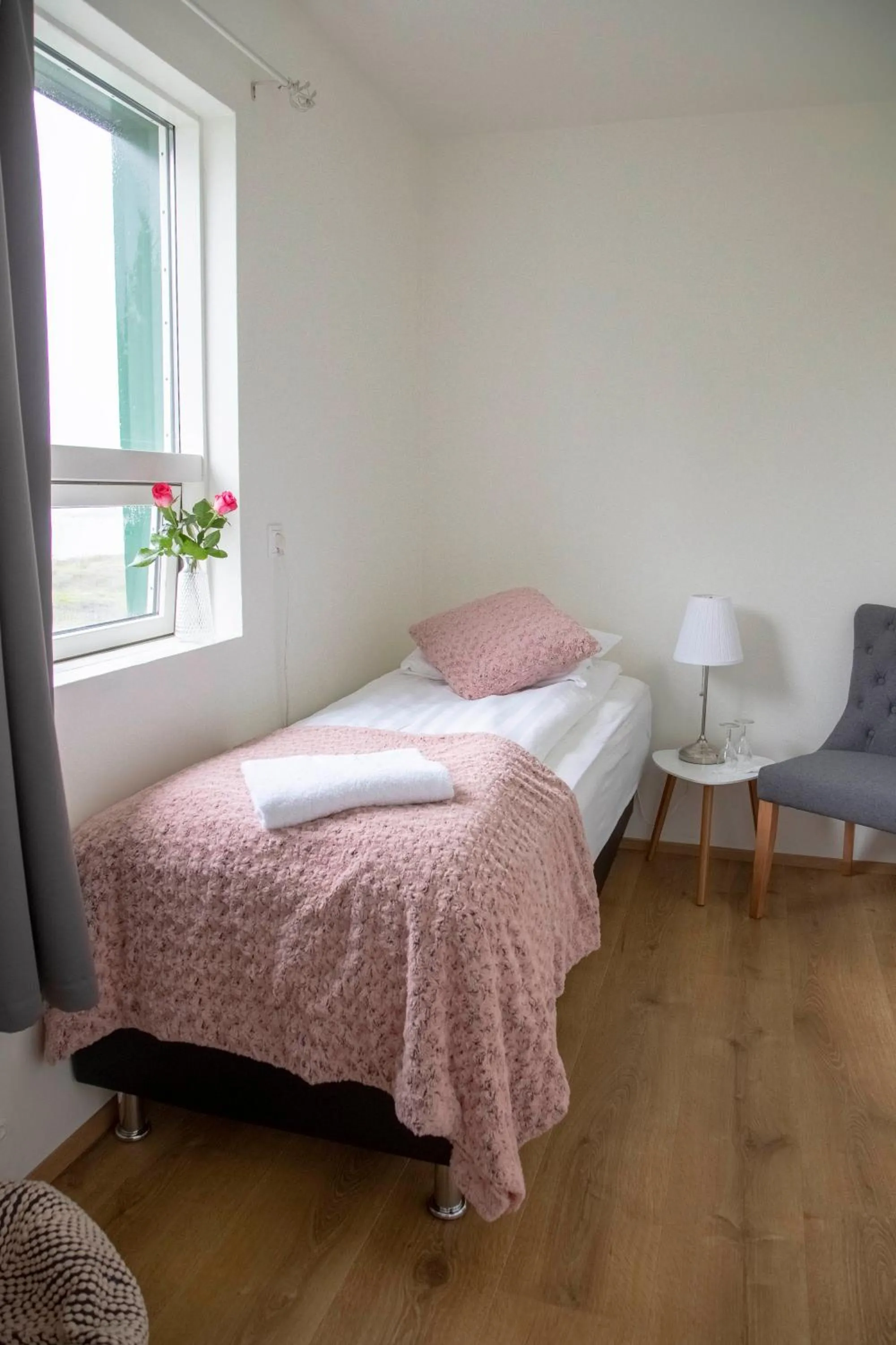 Bed in Blómasetrið Homestay
