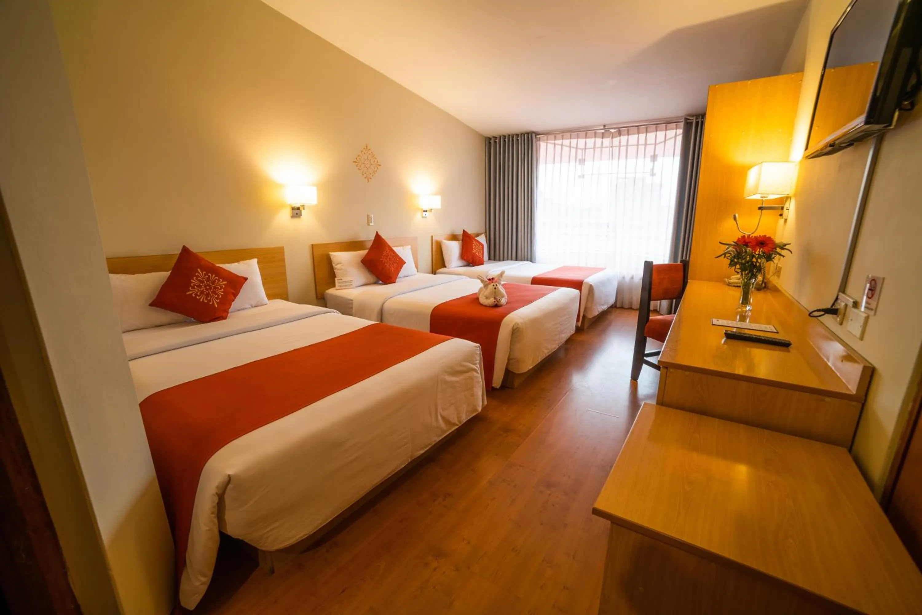 Photo of the whole room, Bed in Lake Titicaca Hotel