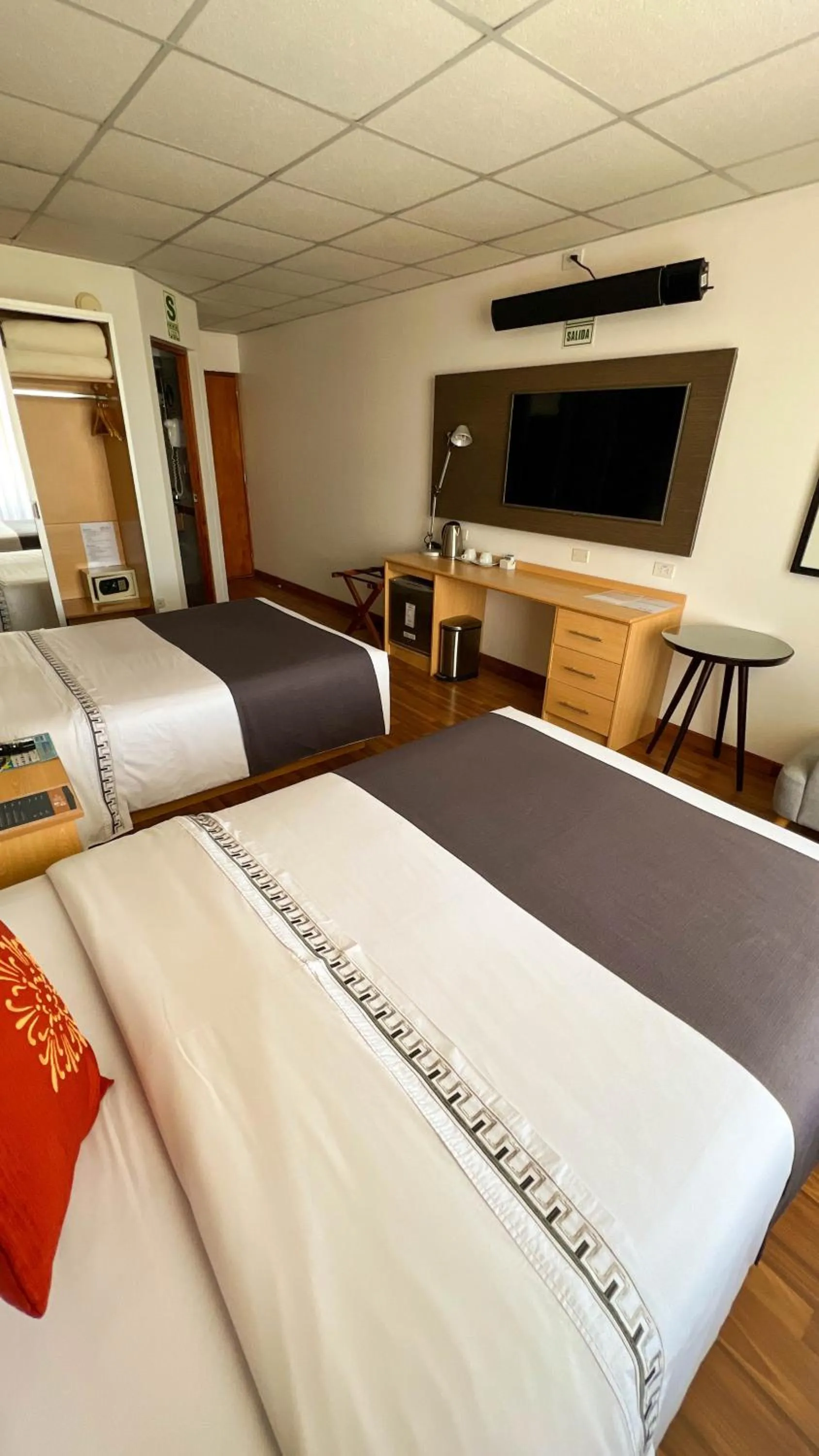 Photo of the whole room, Bed in Lake Titicaca Hotel