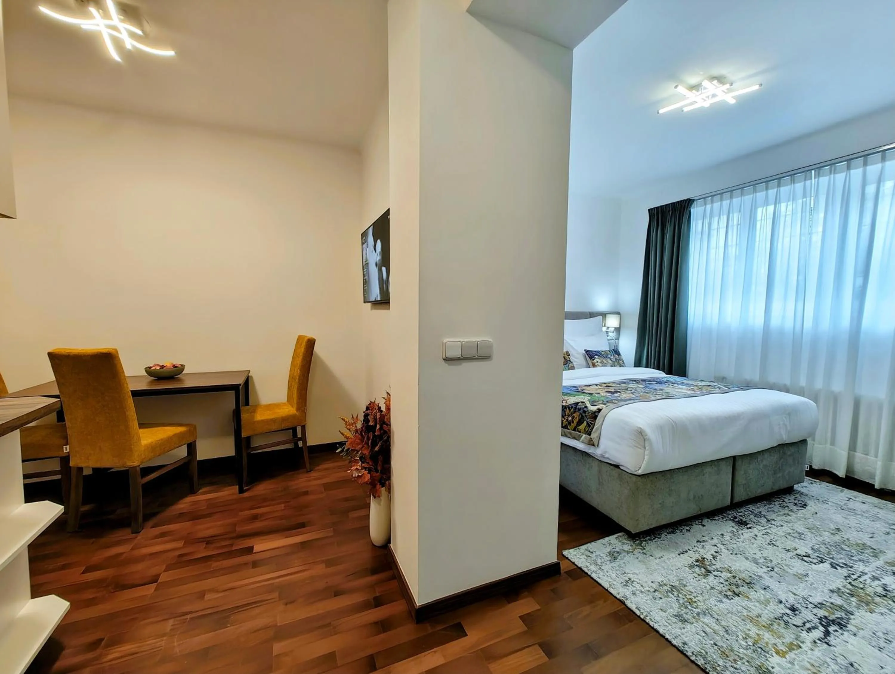 Living room, Bed in Old Town Residence by Little King