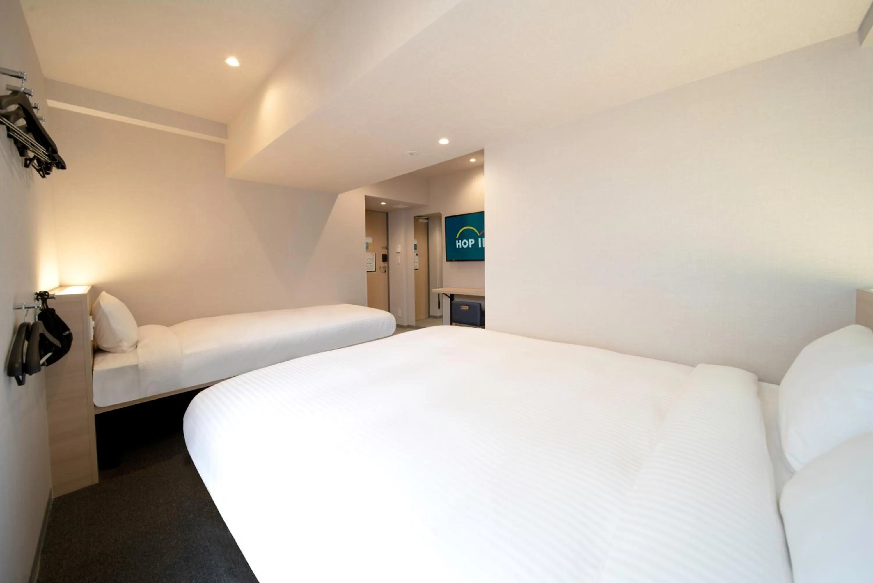 Bed in Hop Inn Tokyo Ueno