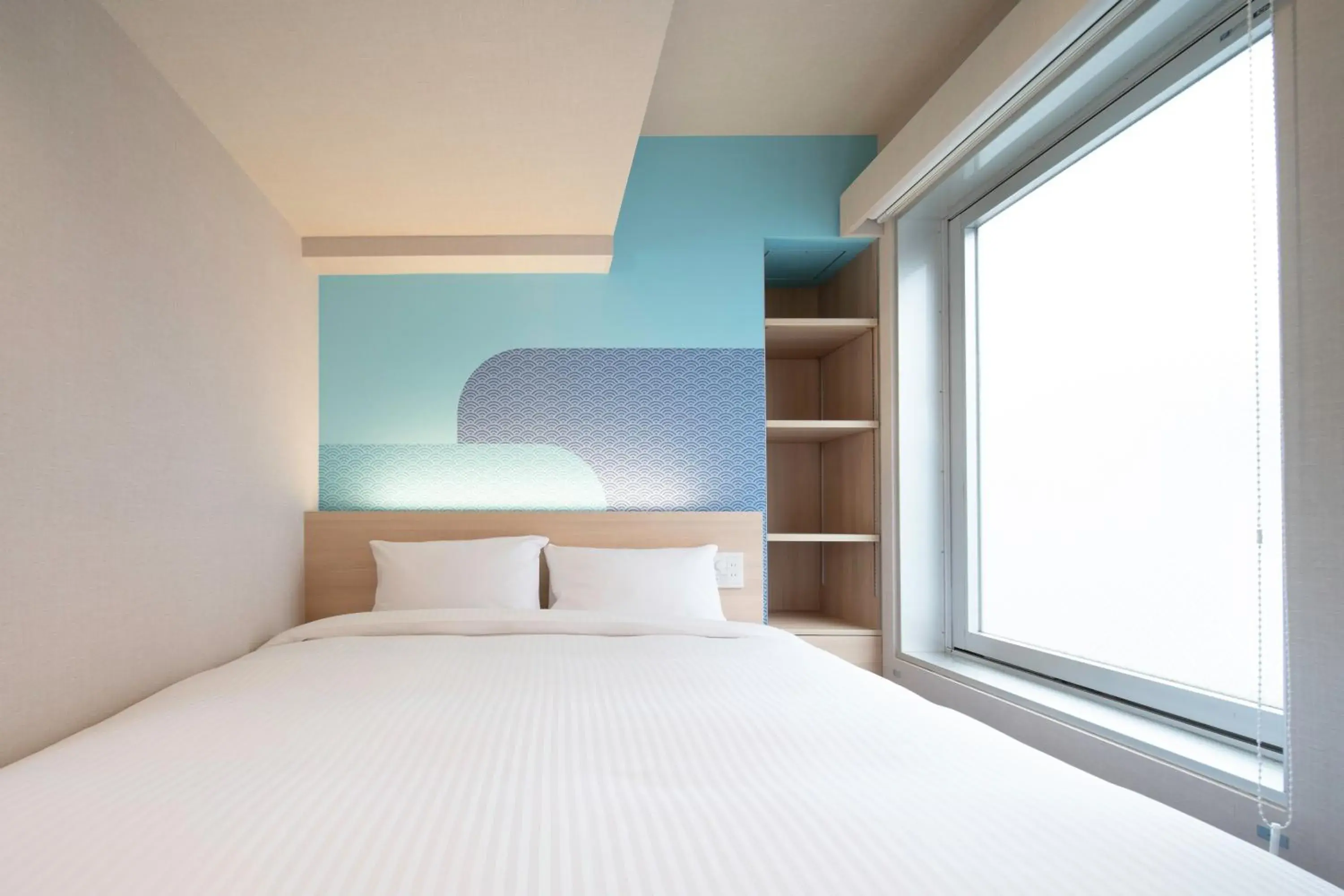 Bed in Hop Inn Tokyo Ueno Bed in Hop Inn Tokyo Ueno