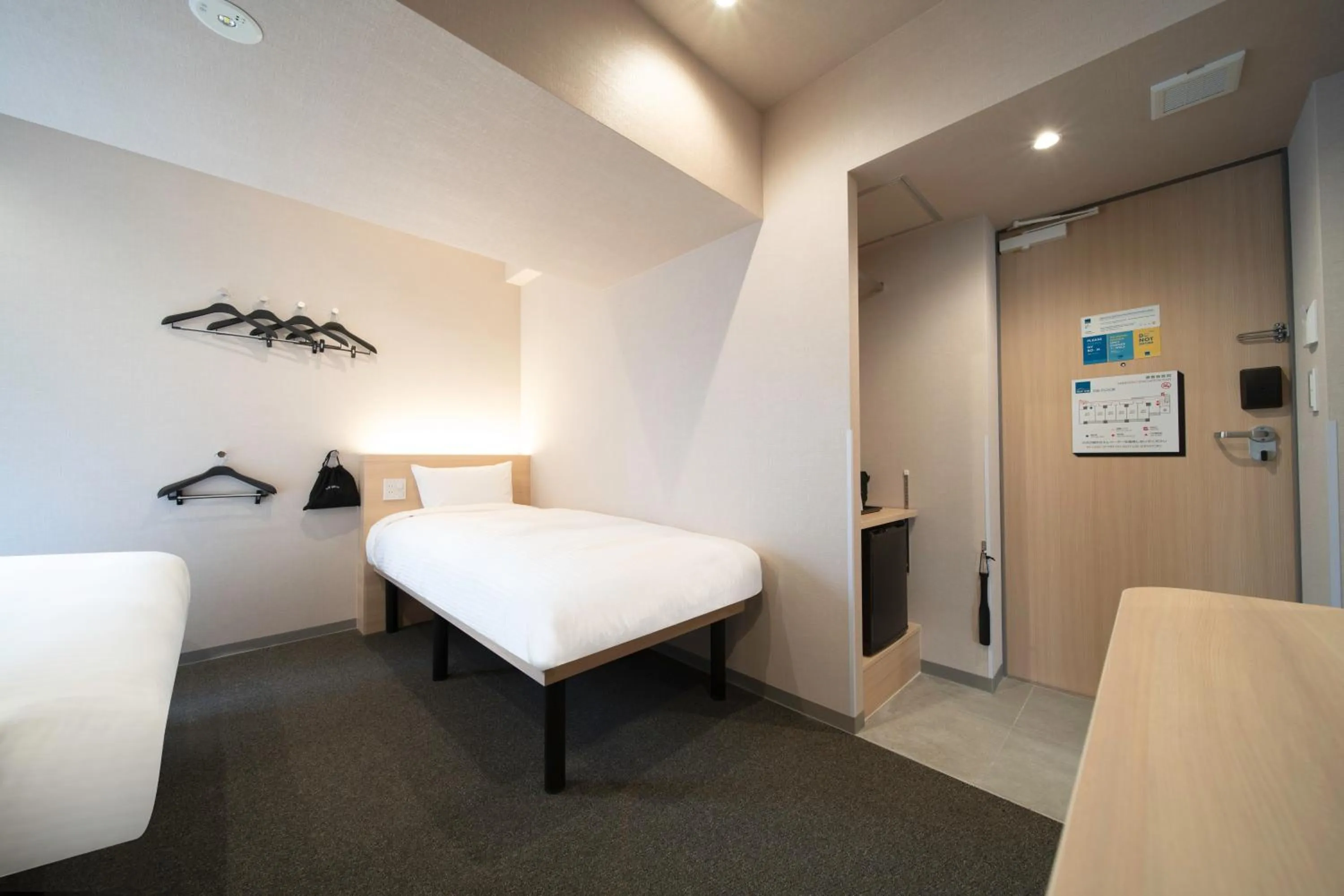 Bed in Hop Inn Tokyo Ueno