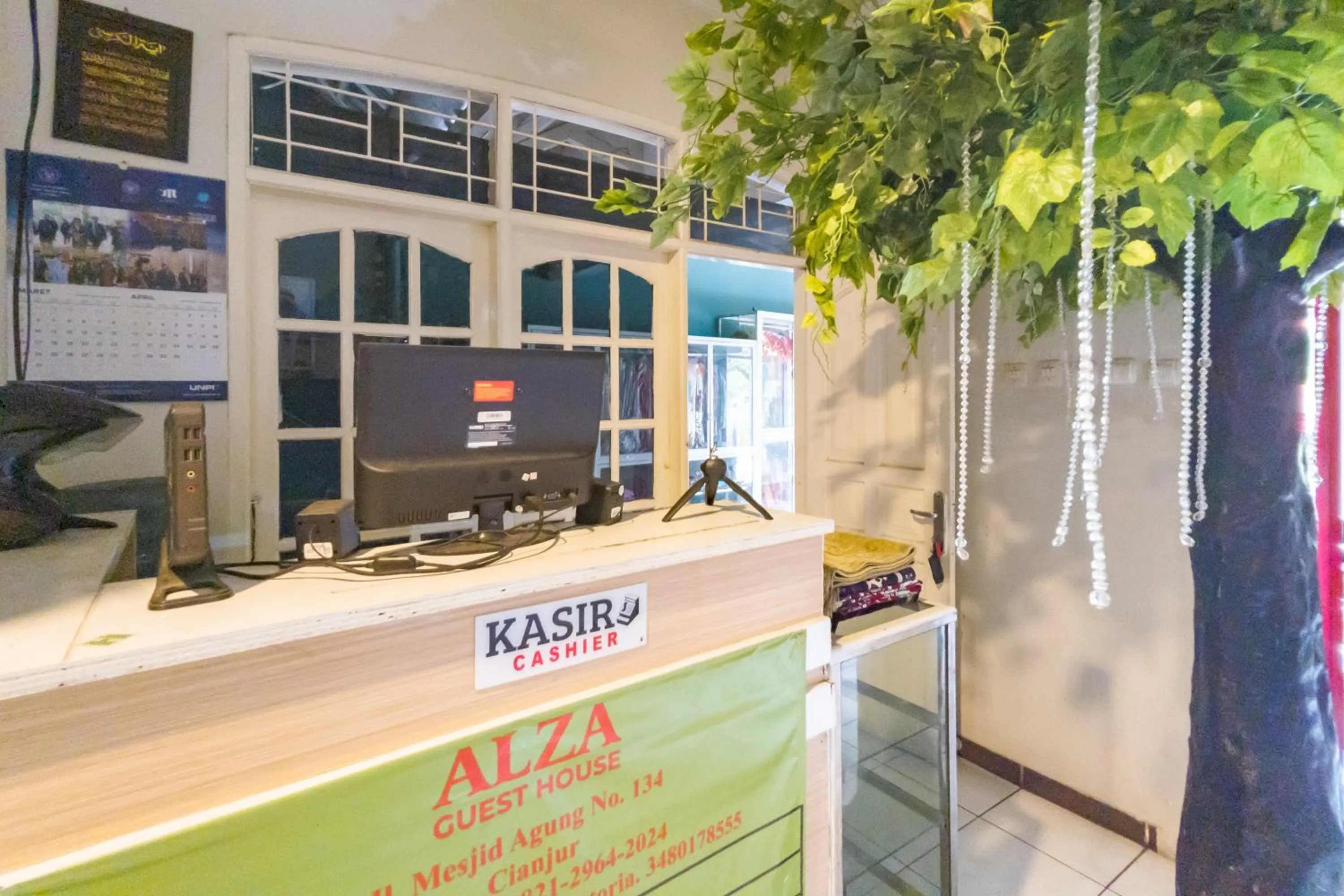 Lobby or reception in Urbanview Alza by RedDoorz
