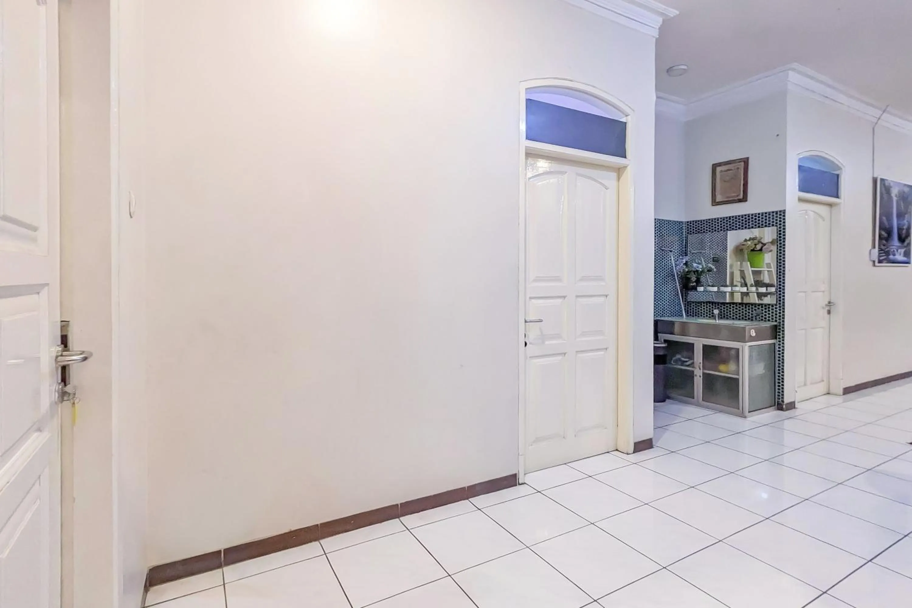 Property building in Urbanview Alza by RedDoorz