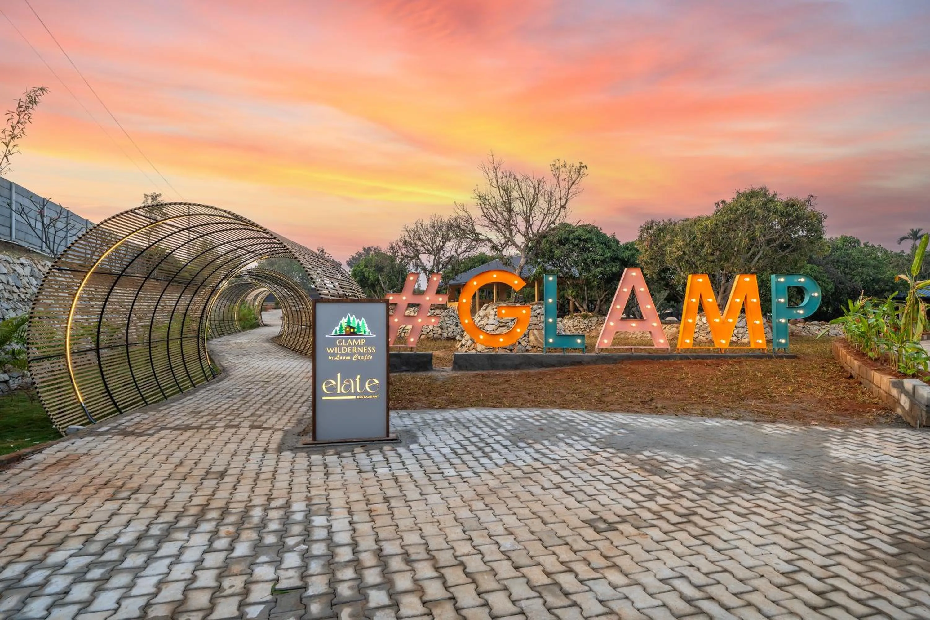 Property logo or sign in Glamp Wilderness