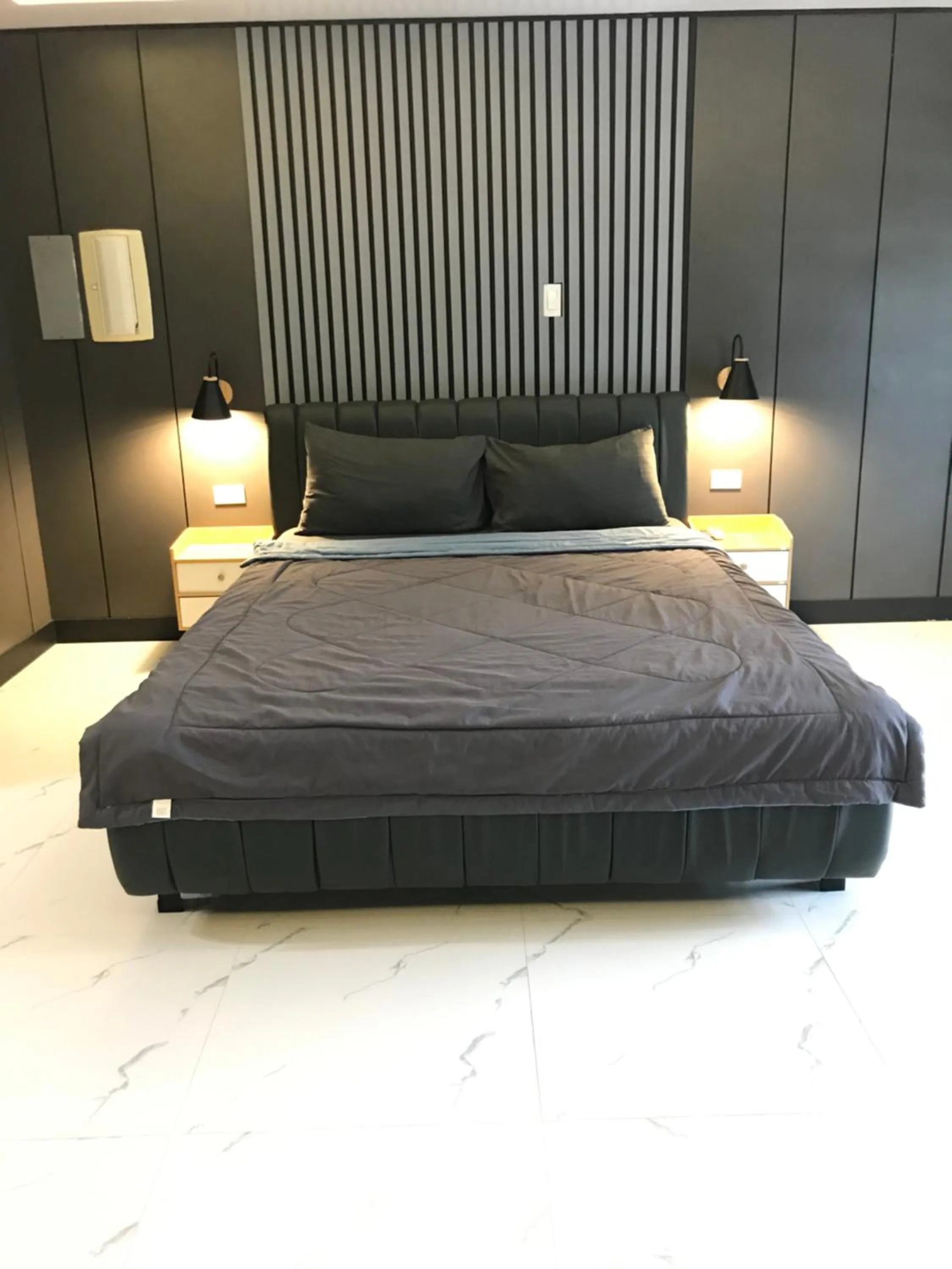 Bed in Clark CU Hotel