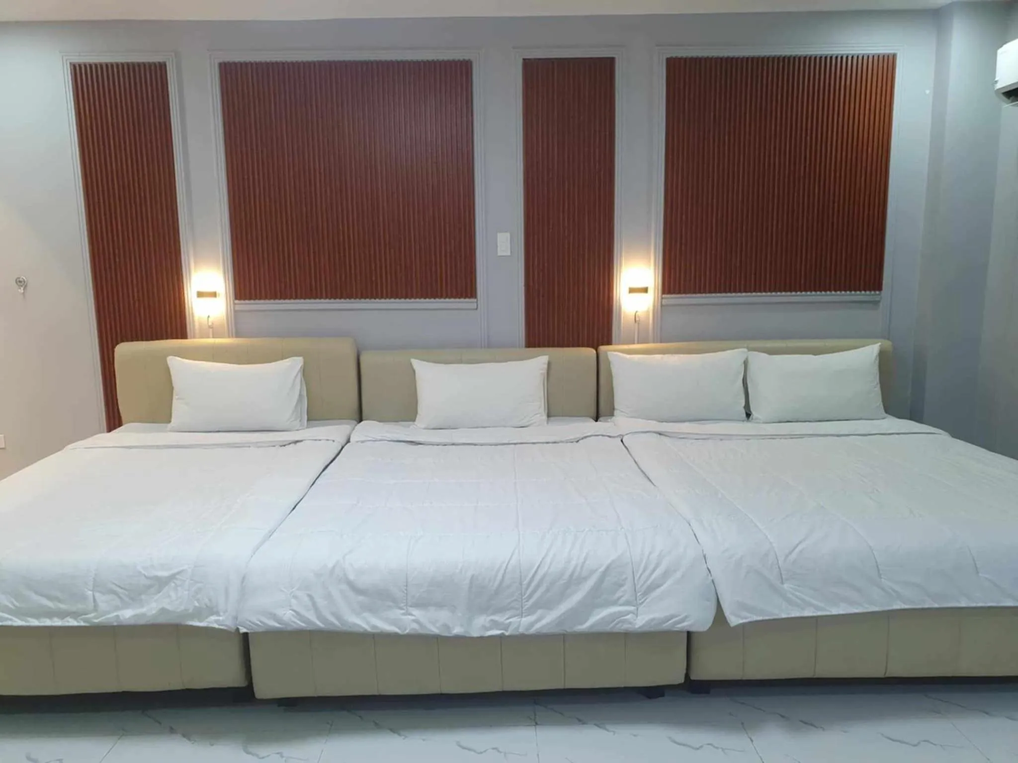 Bed in Clark CU Hotel