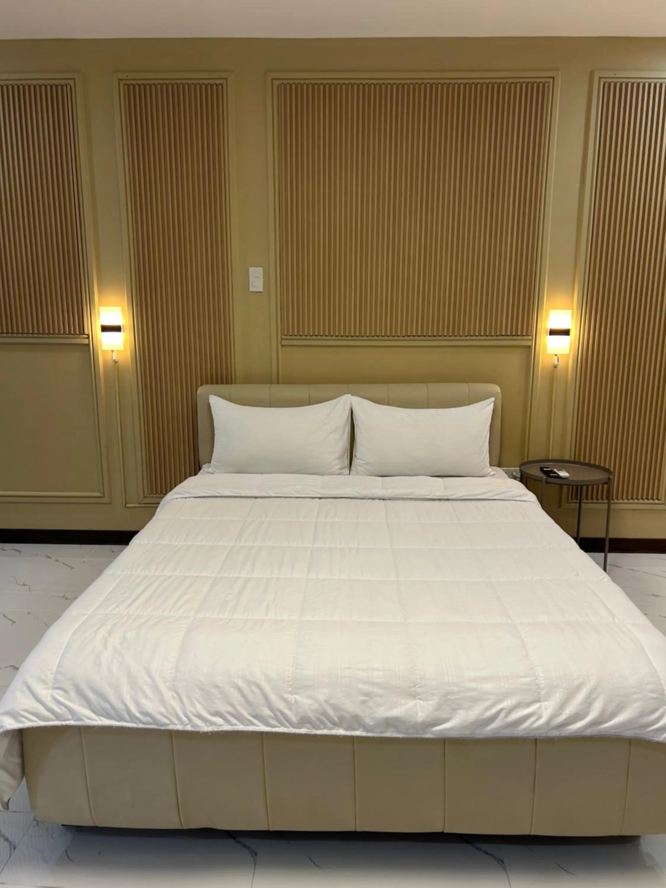 Bed in Clark CU Hotel
