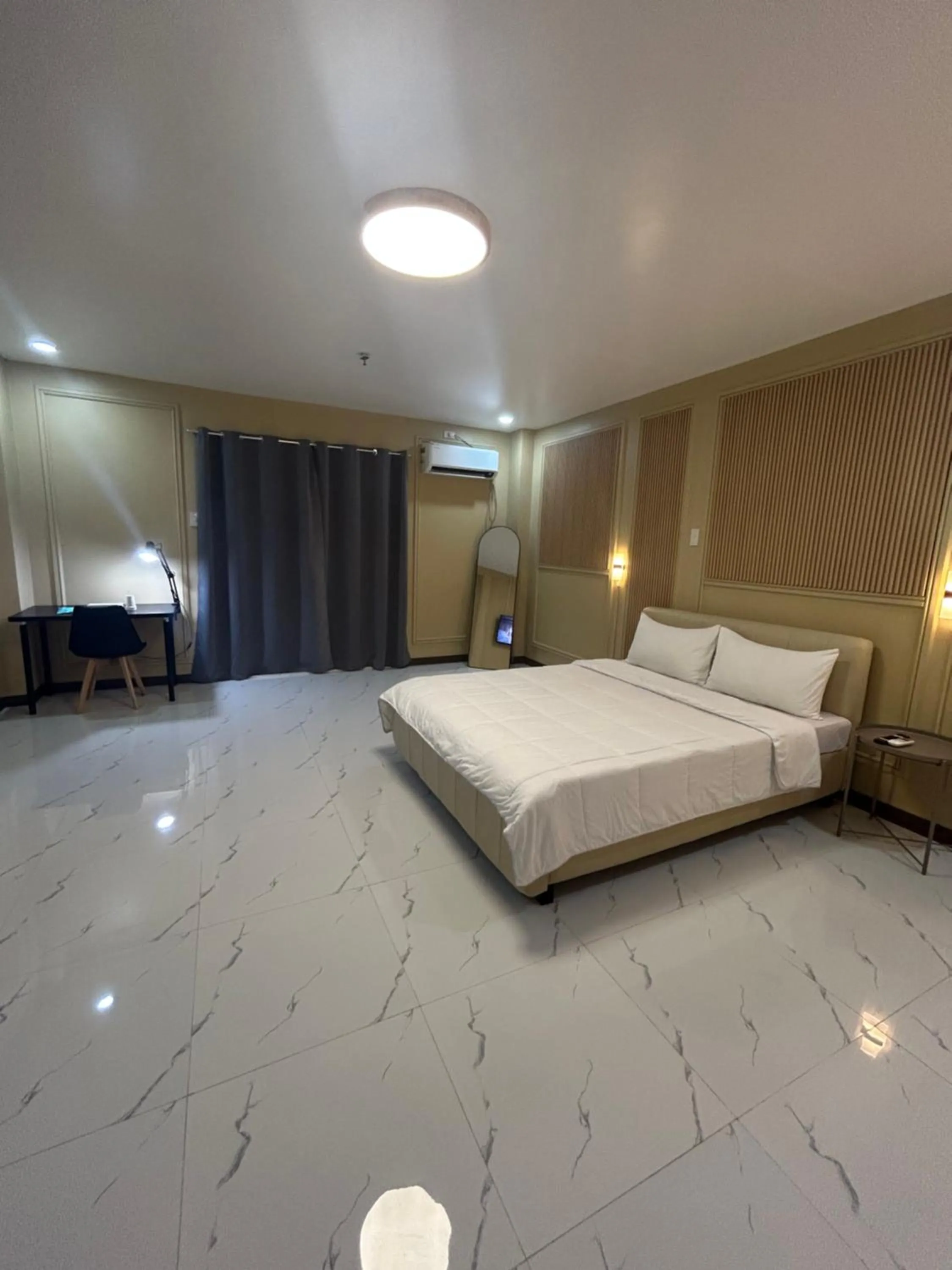 Bed in Clark CU Hotel