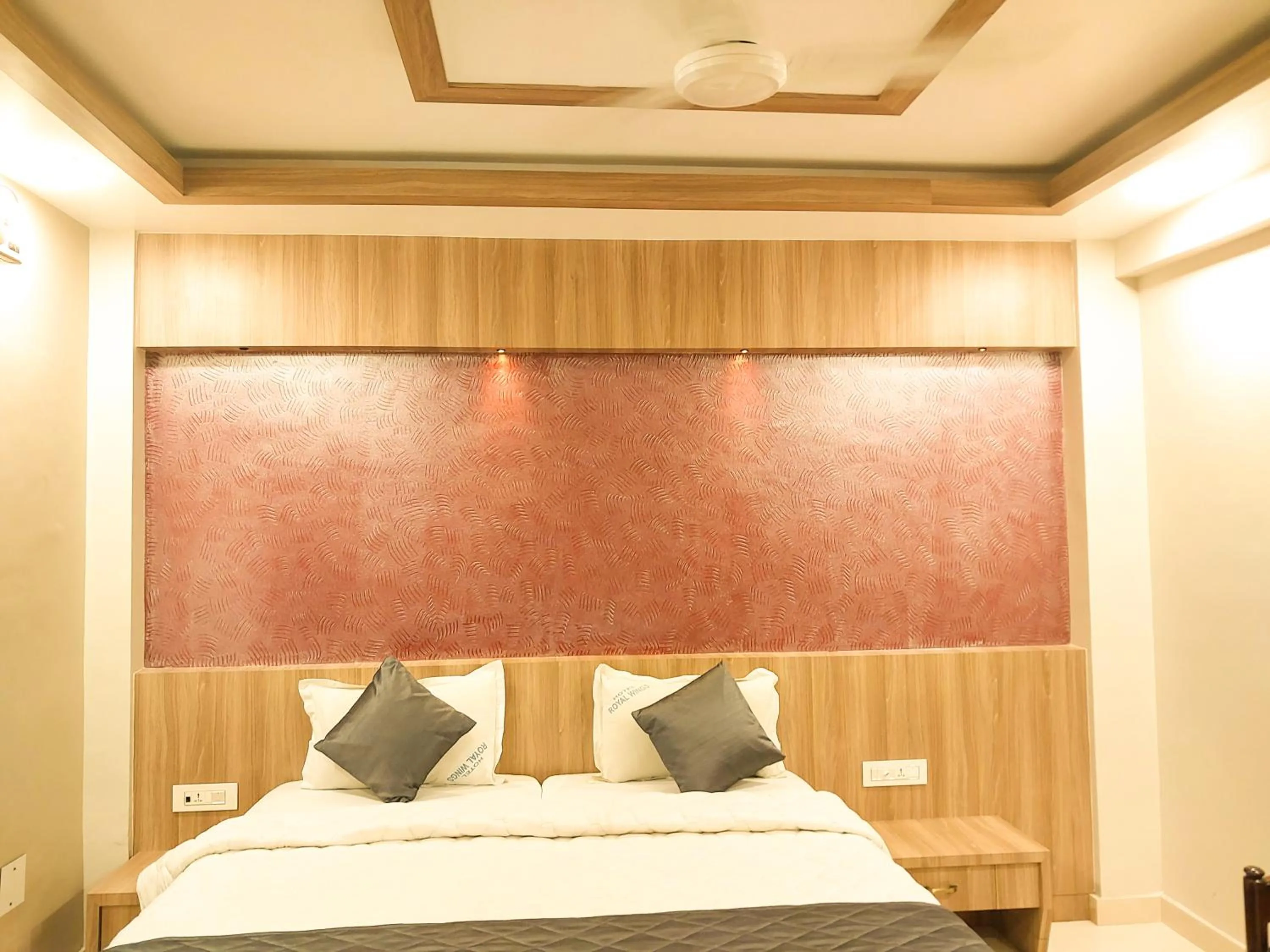 Bed in Hotel Royal Wings