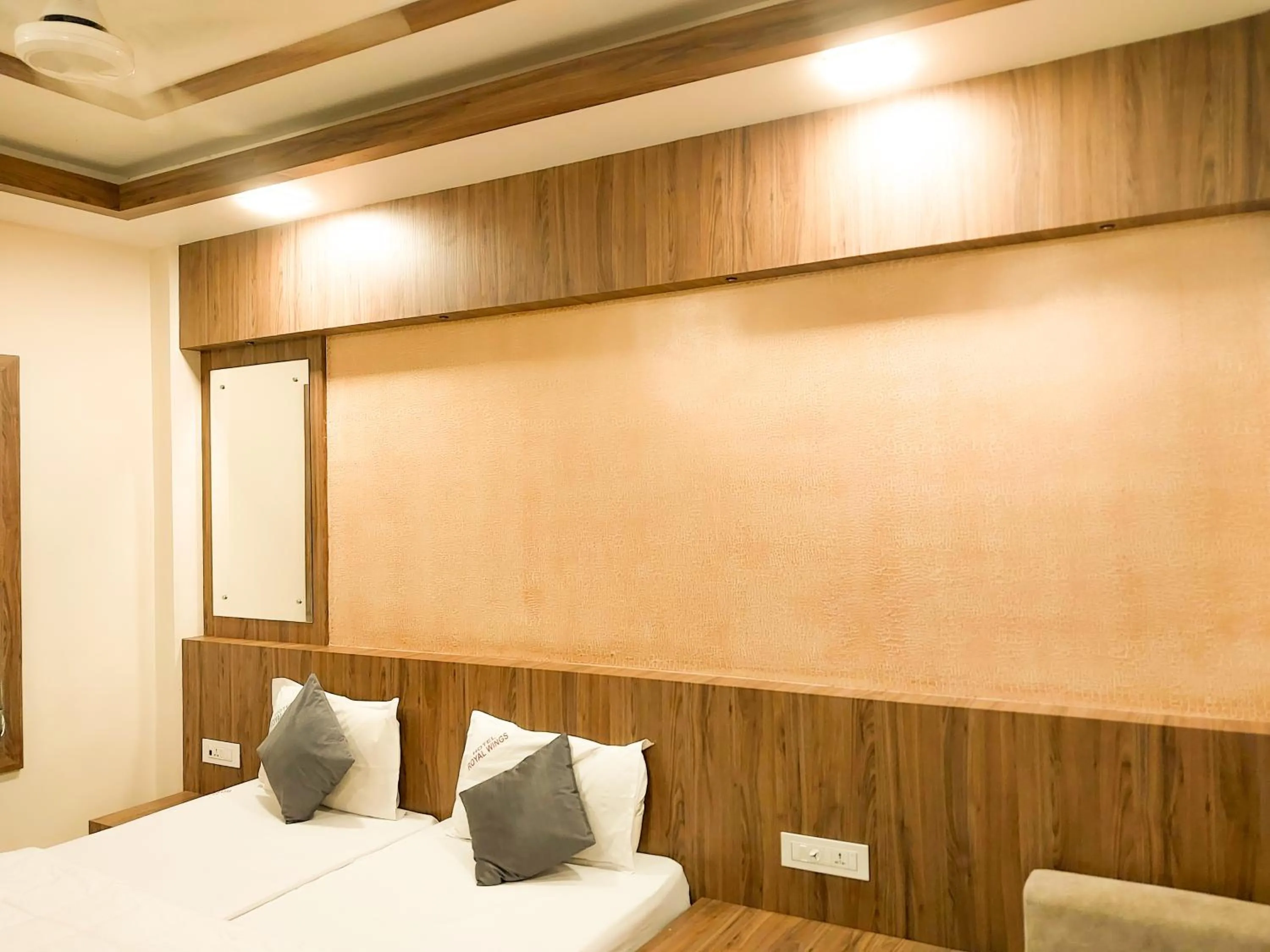 Bed in Hotel Royal Wings