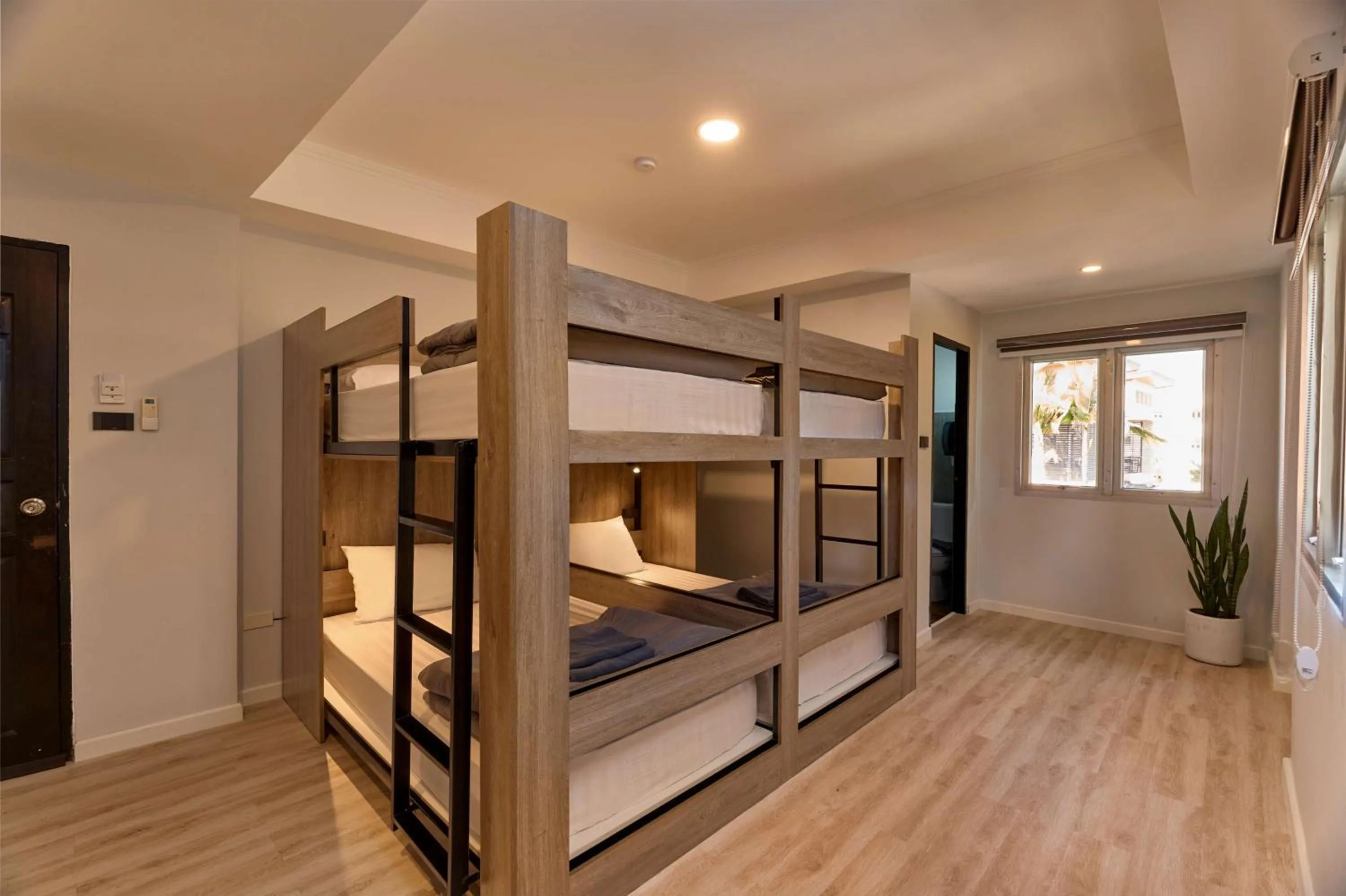 Bed in Thapae60 Mini Hotel