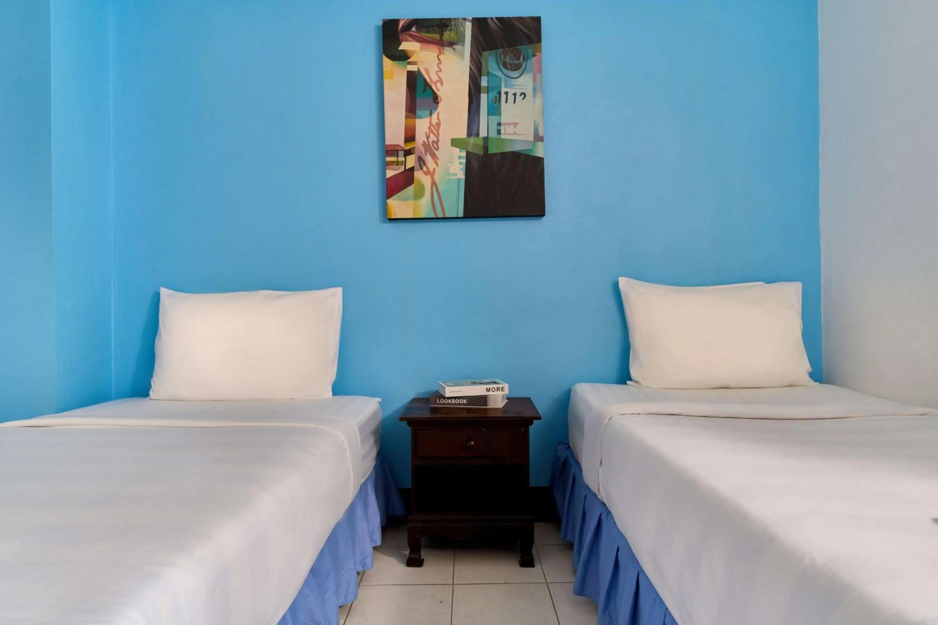 Bed in Thapae60 Mini Hotel