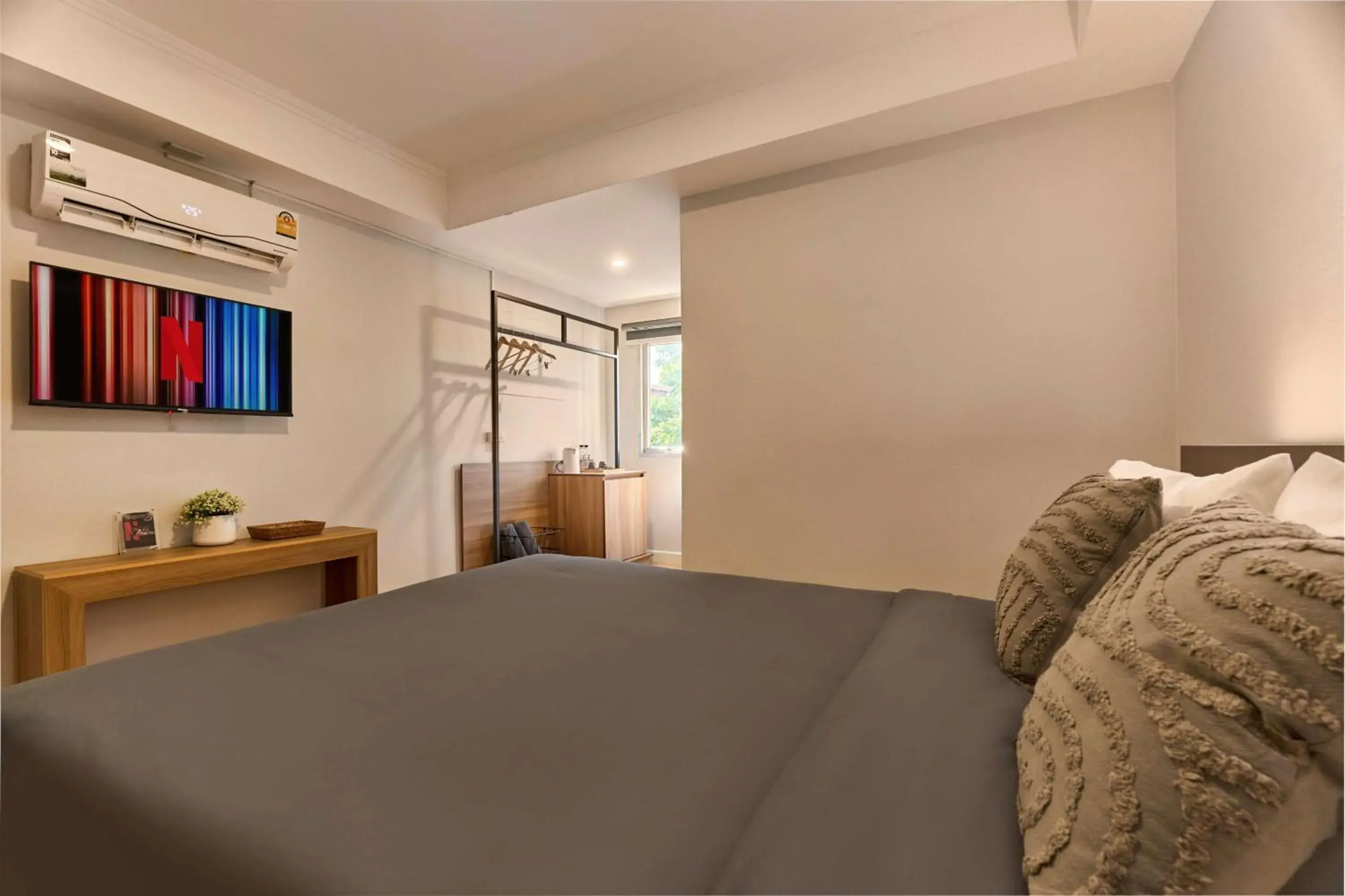 Bed in Thapae60 Mini Hotel Bed in Thapae60 Mini Hotel