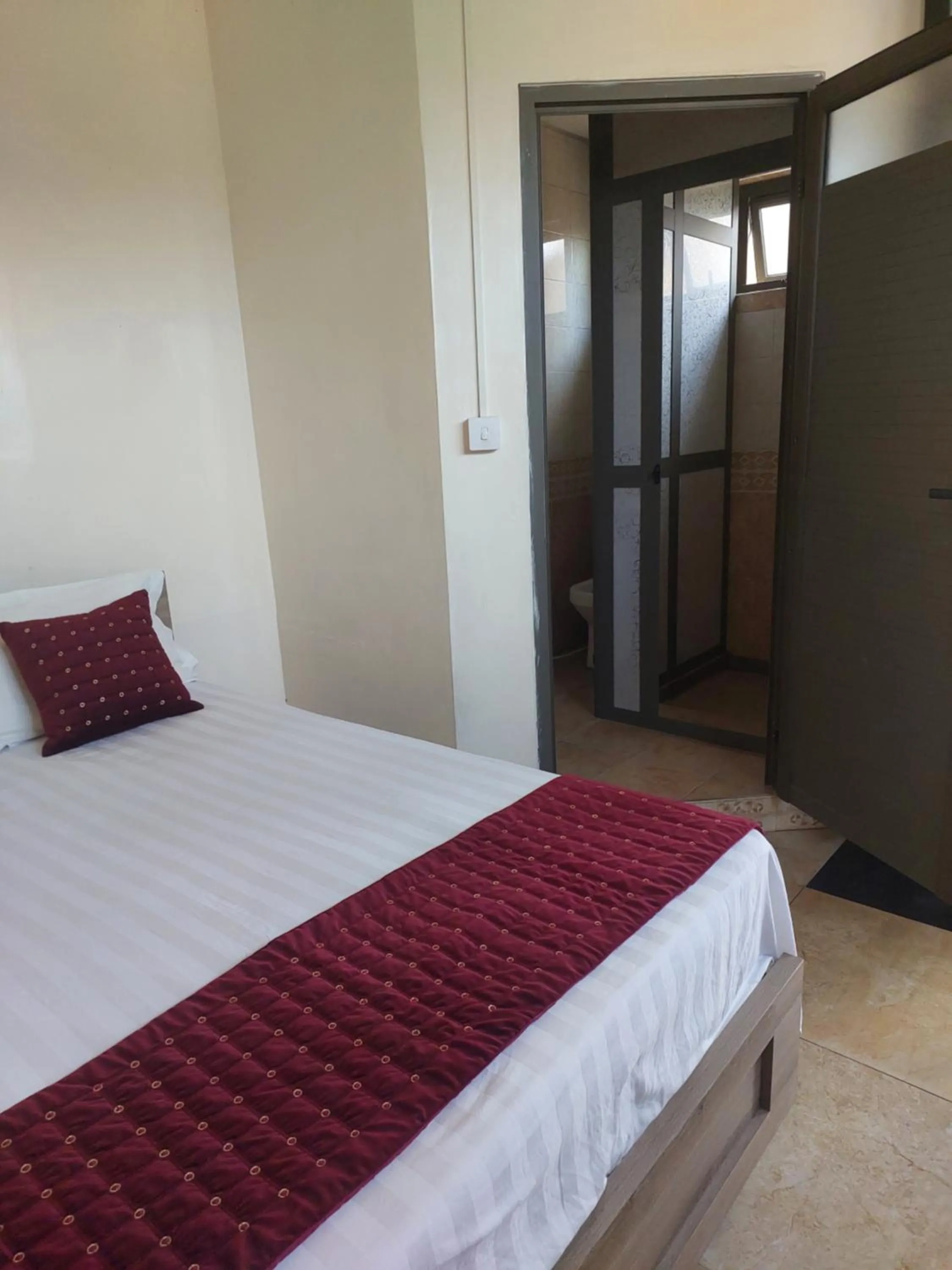 Bed in Blue Bay Holiday Resort