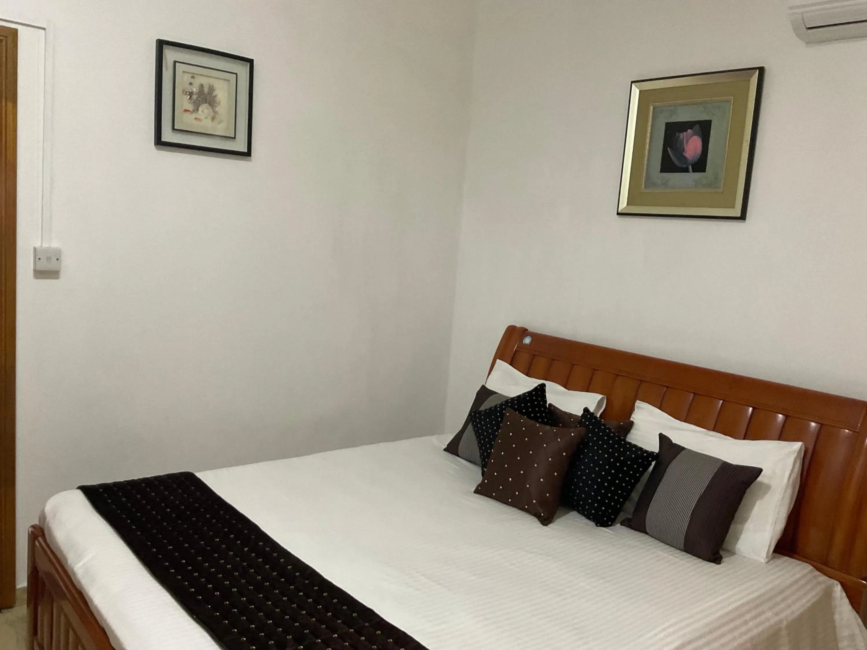 Bed in Blue Bay Holiday Resort