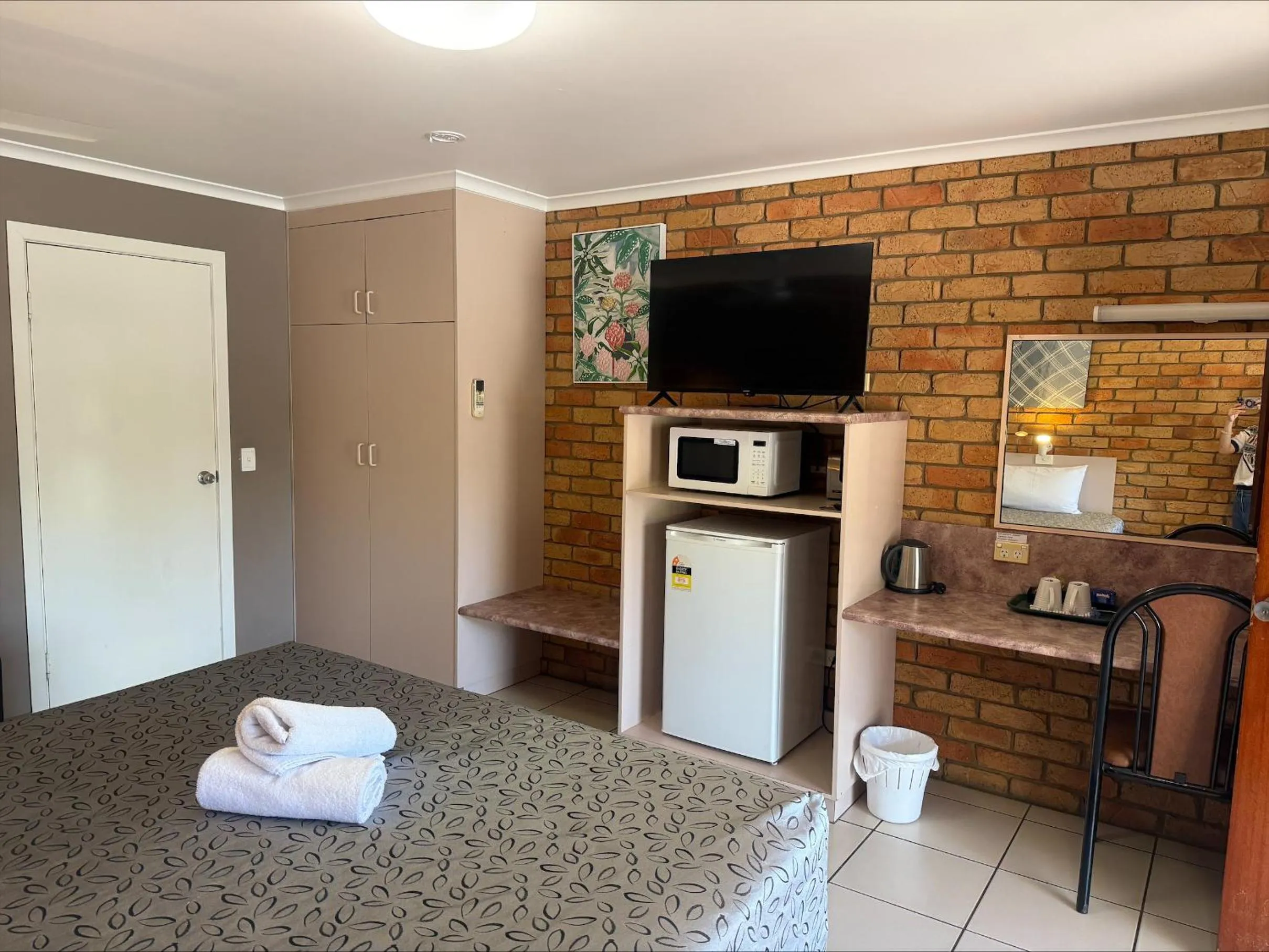 Bed in Emerald Highlands Motel