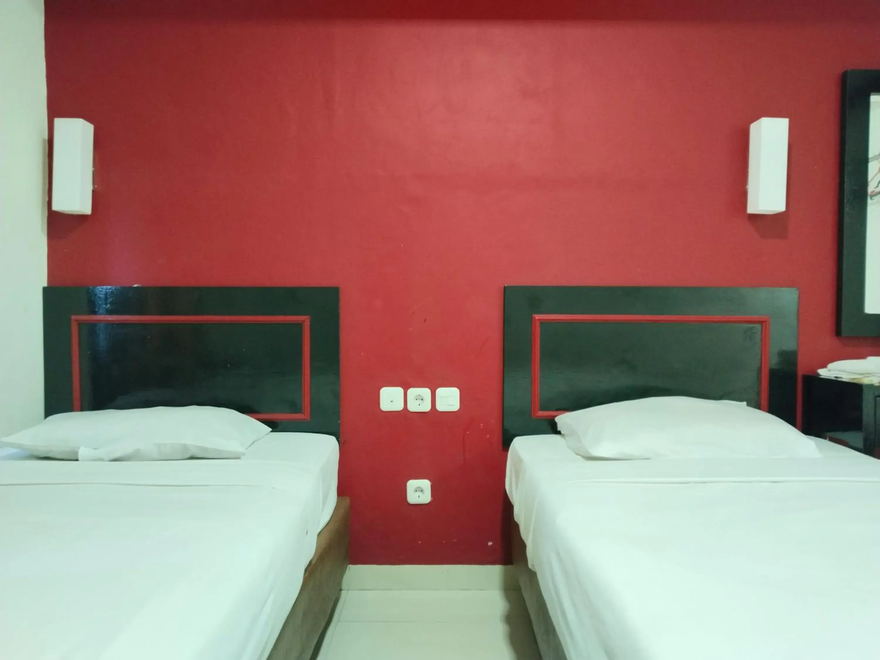Bed in Metro Hotel Bekasi powered by Cocotel Bed in Metro Hotel Bekasi powered by Cocotel
