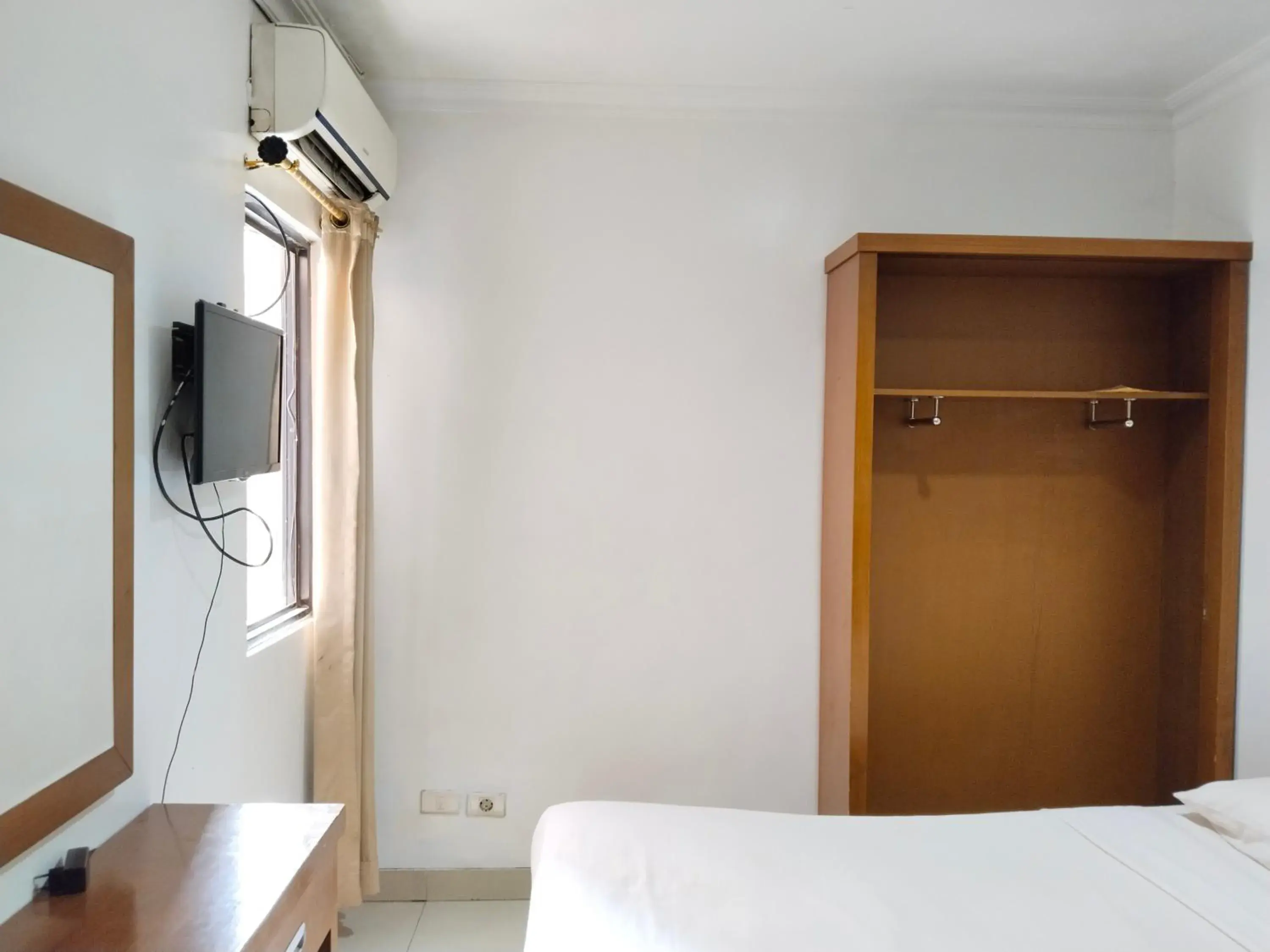 Bed in Metro Hotel Bekasi powered by Cocotel Bed in Metro Hotel Bekasi powered by Cocotel