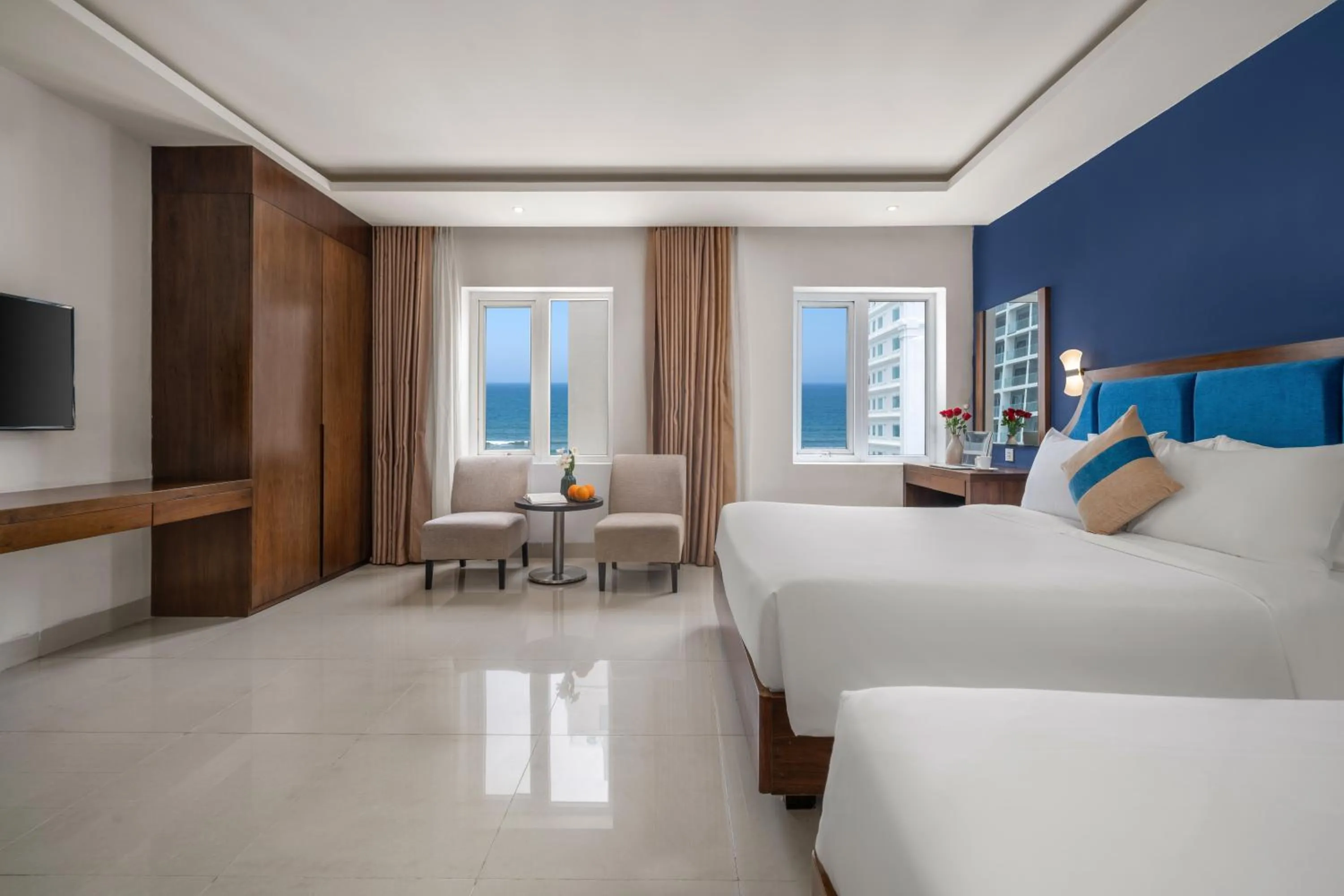 Bed in TGT BEACH HOTEL