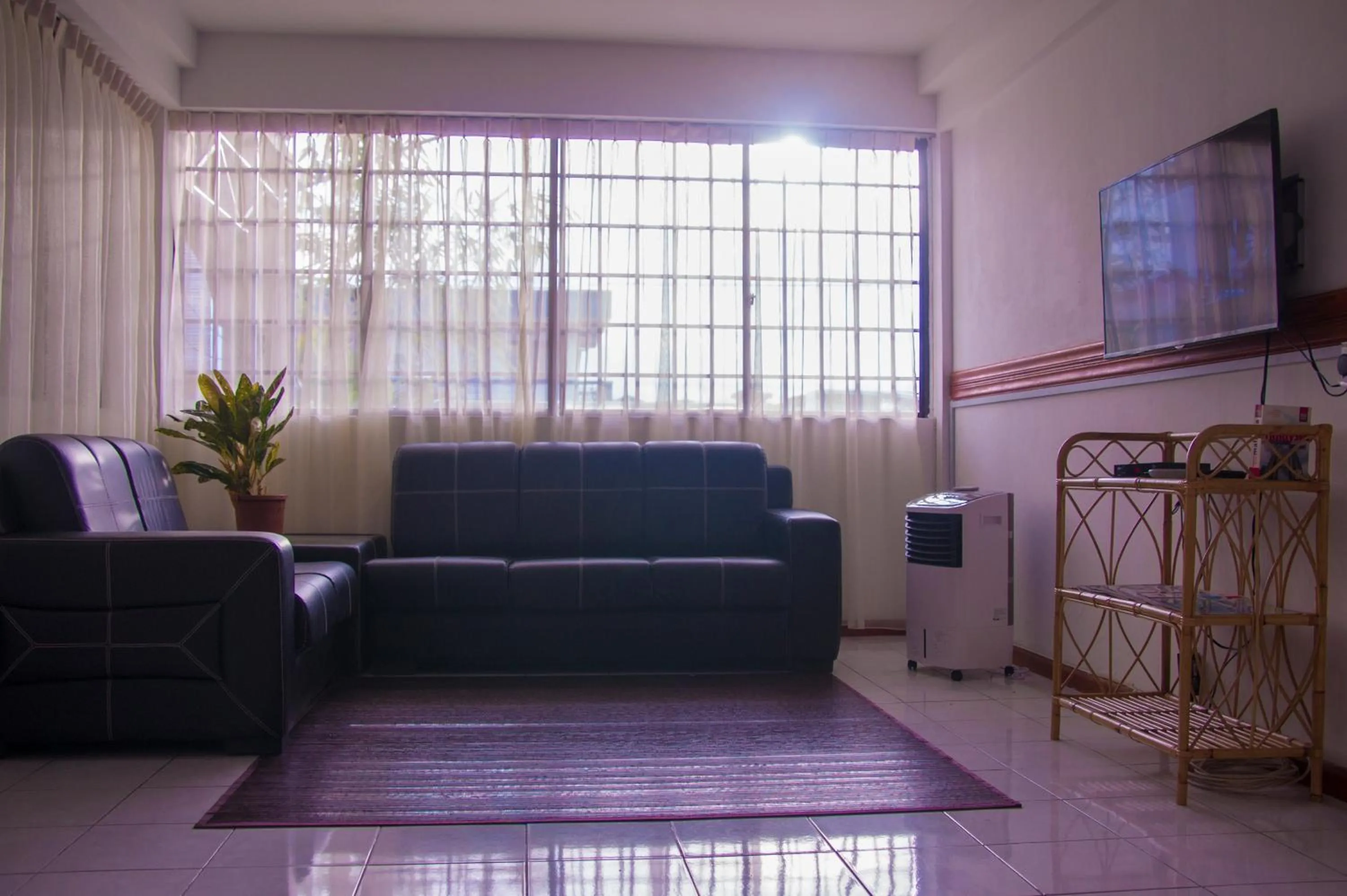 Communal lounge/ TV room in HAKS Boutique B&B with Pool & Farm-to-Table Dining