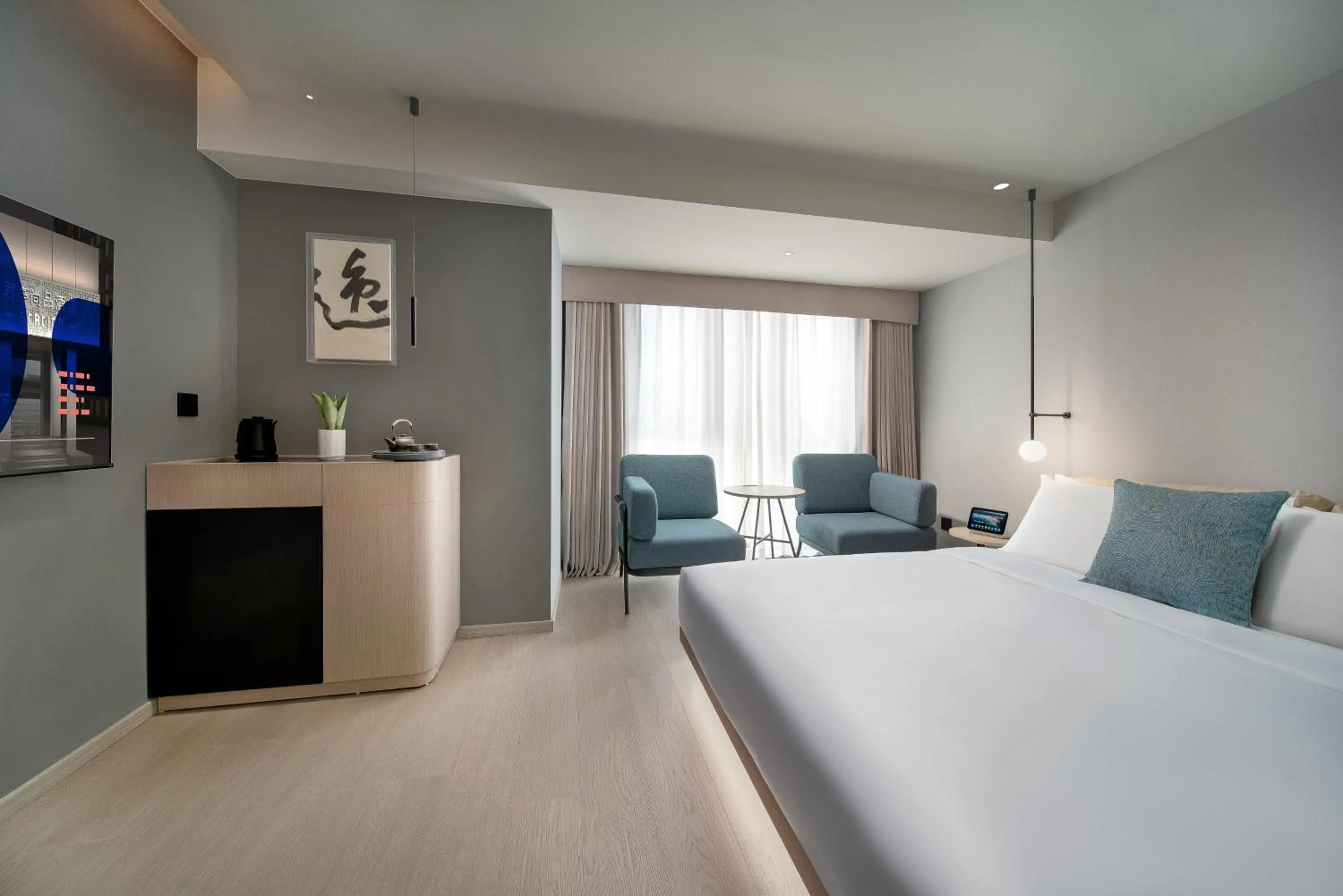 Bedroom, Bed in CYBO Station SSAW Shangpin Hotel Luohu Shenzhen