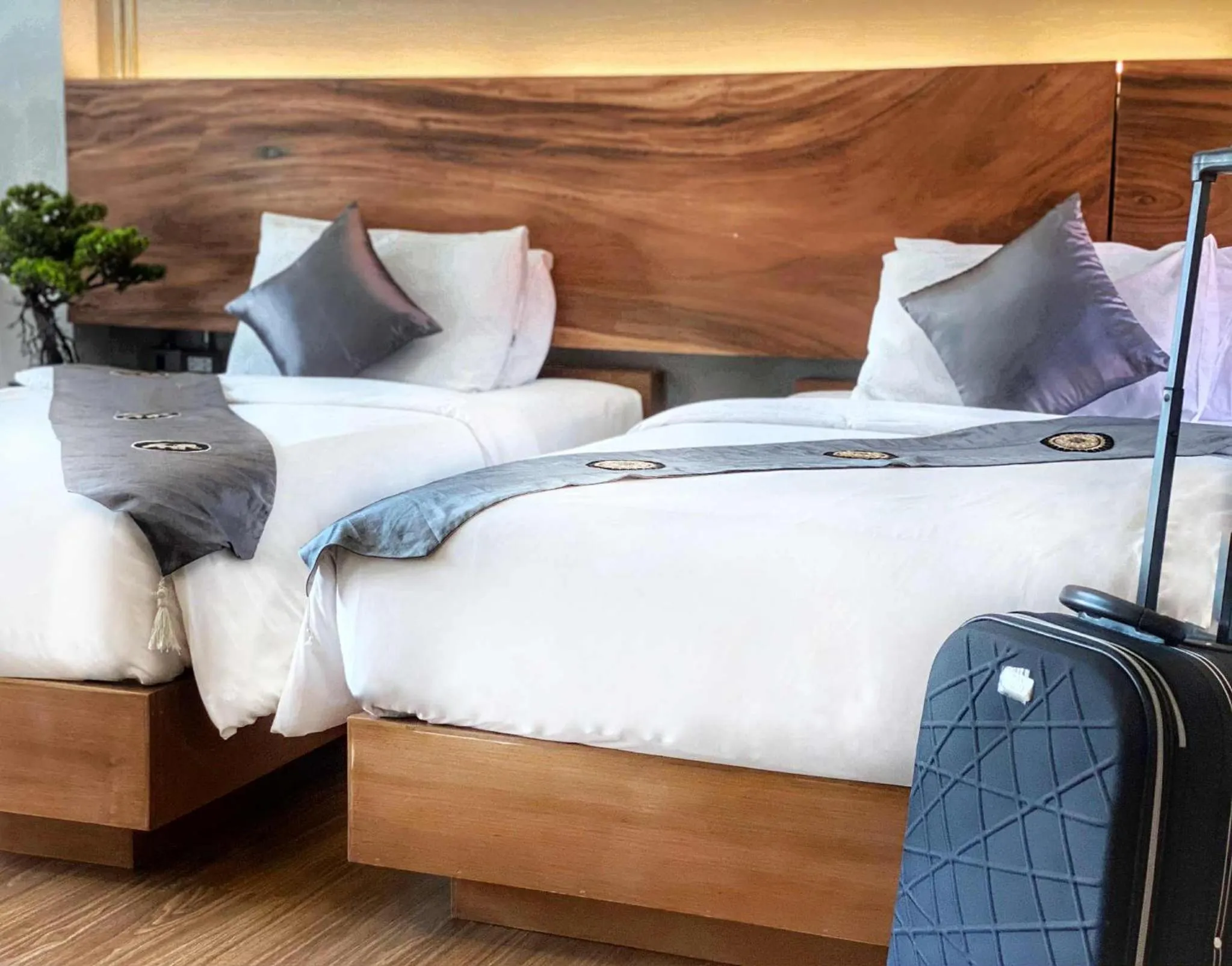 Bed in Lanna Tree Boutique Hotel