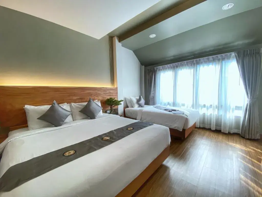 Bed in Lanna Tree Boutique Hotel Bed in Lanna Tree Boutique Hotel