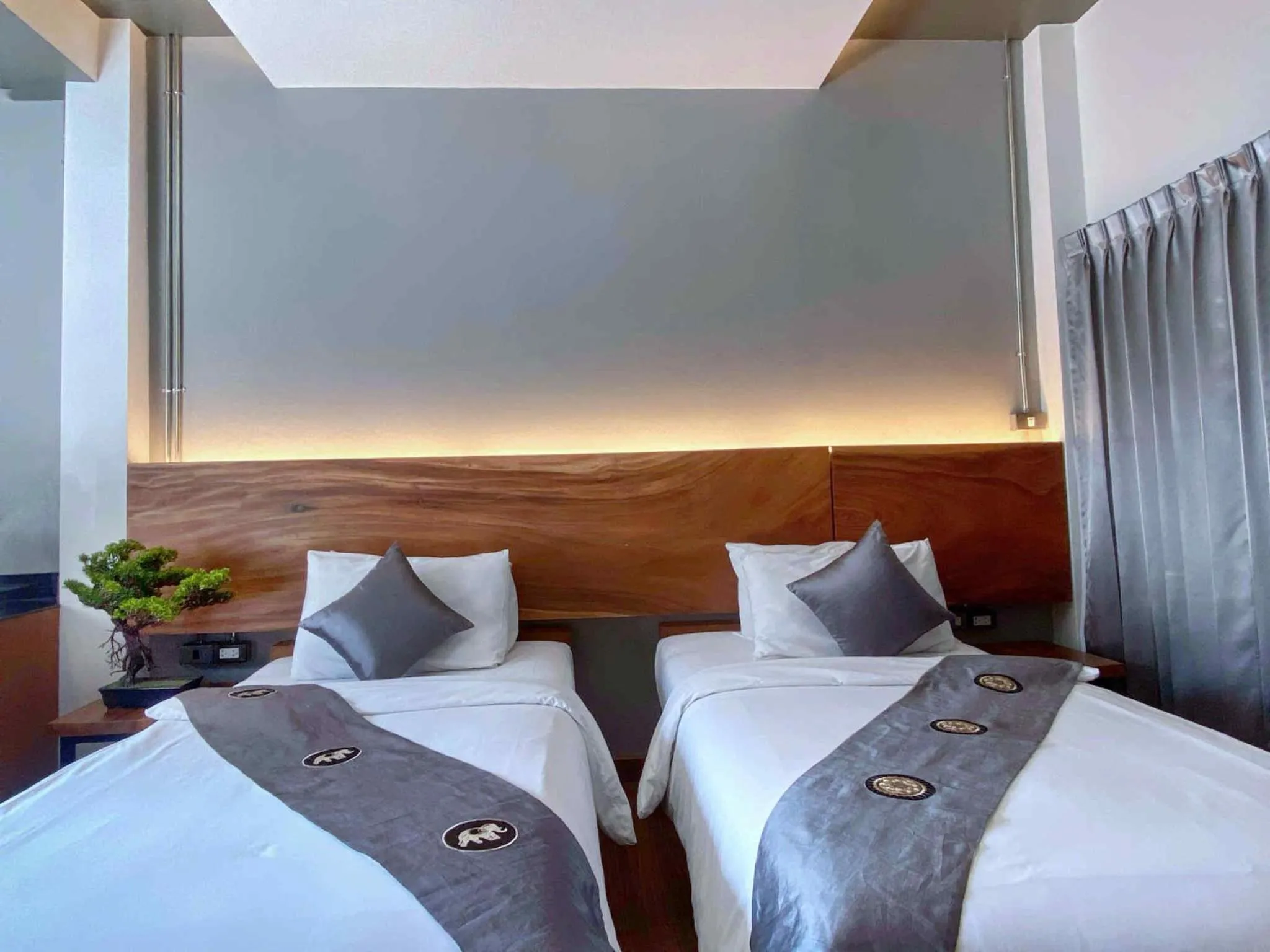 Bed in Lanna Tree Boutique Hotel