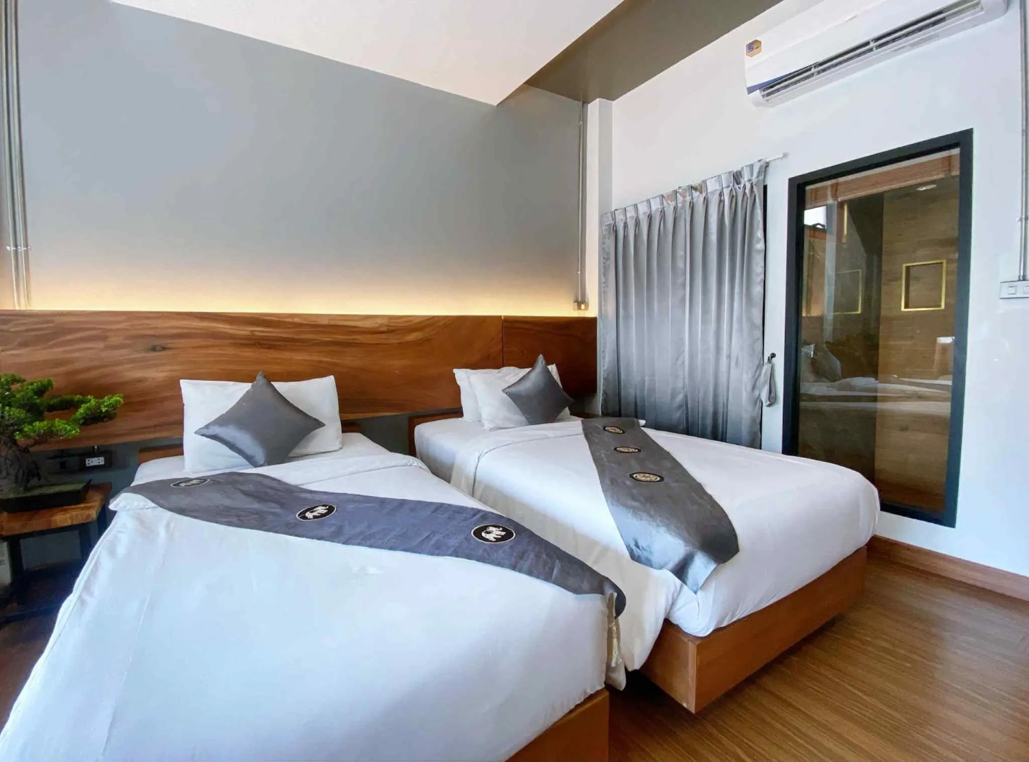 Bed in Lanna Tree Boutique Hotel