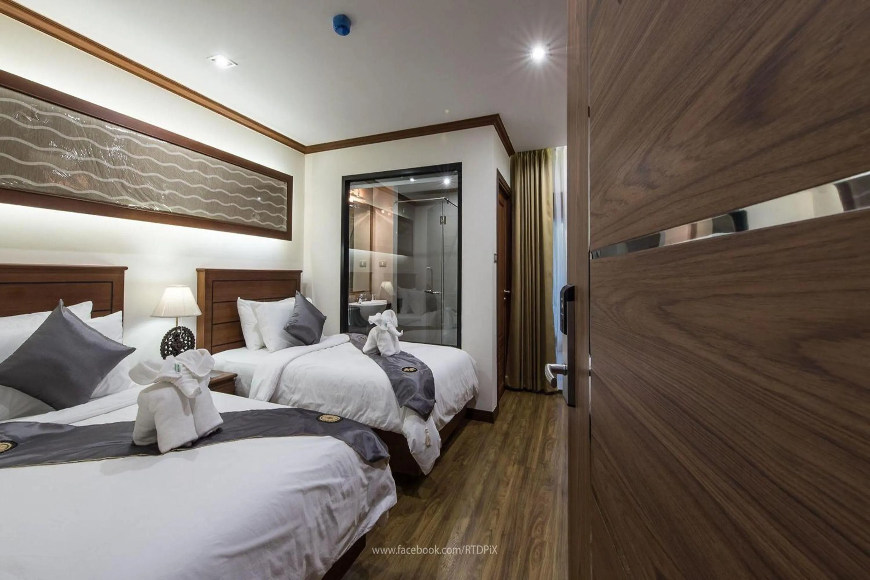 Bed in Lanna Tree Boutique Hotel