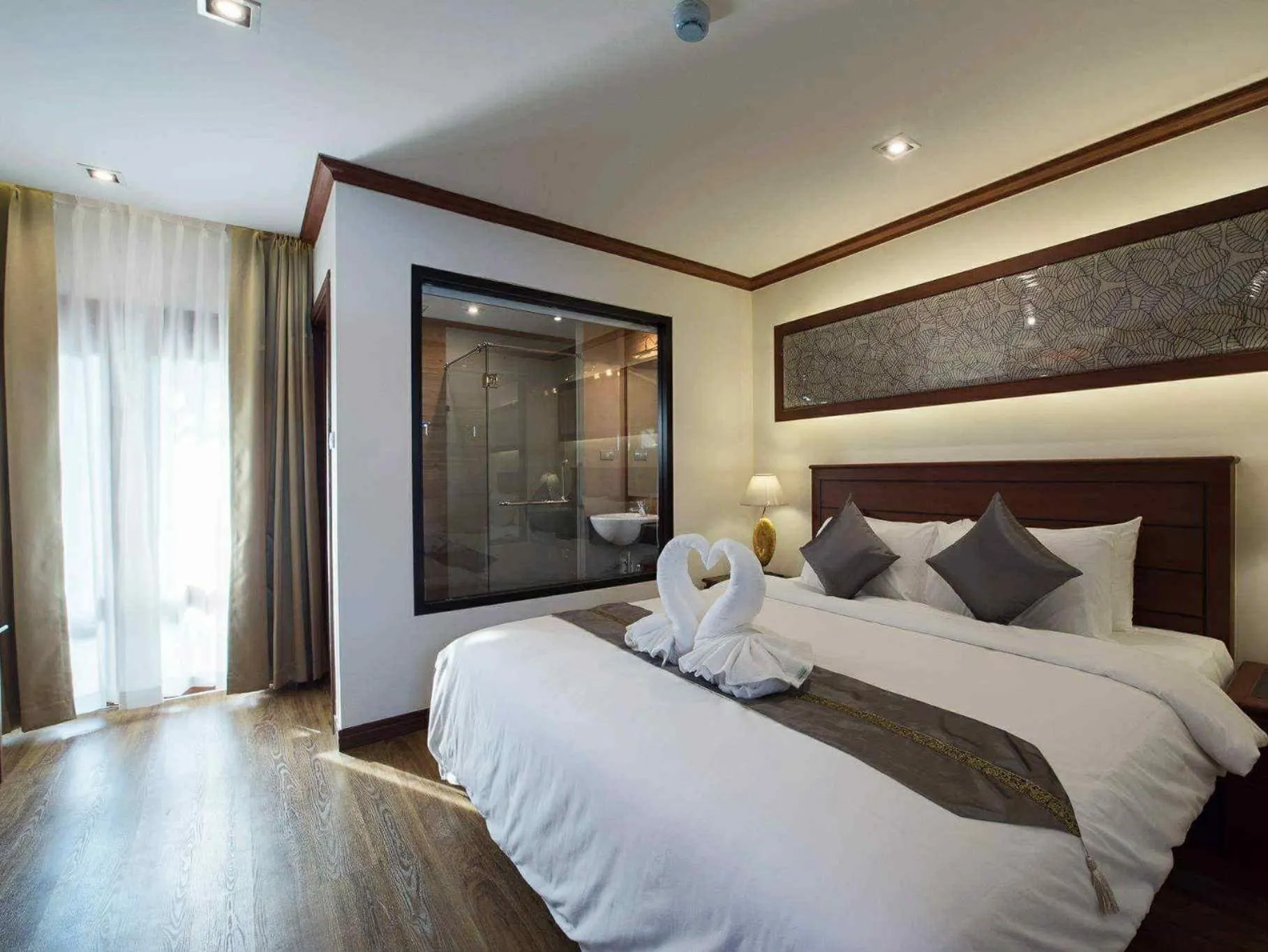 Photo of the whole room, Bed in Lanna Tree Boutique Hotel