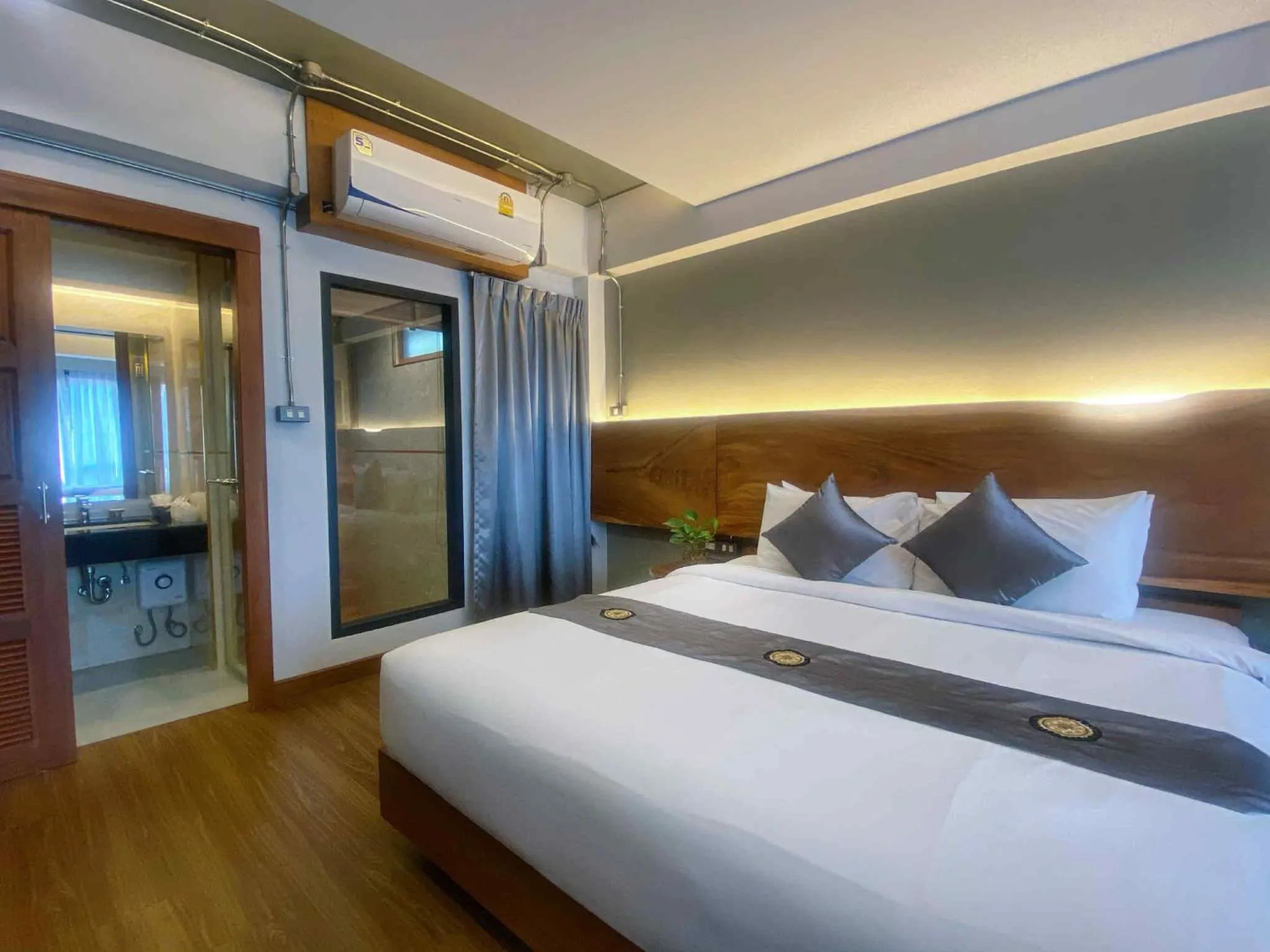 Bed in Lanna Tree Boutique Hotel