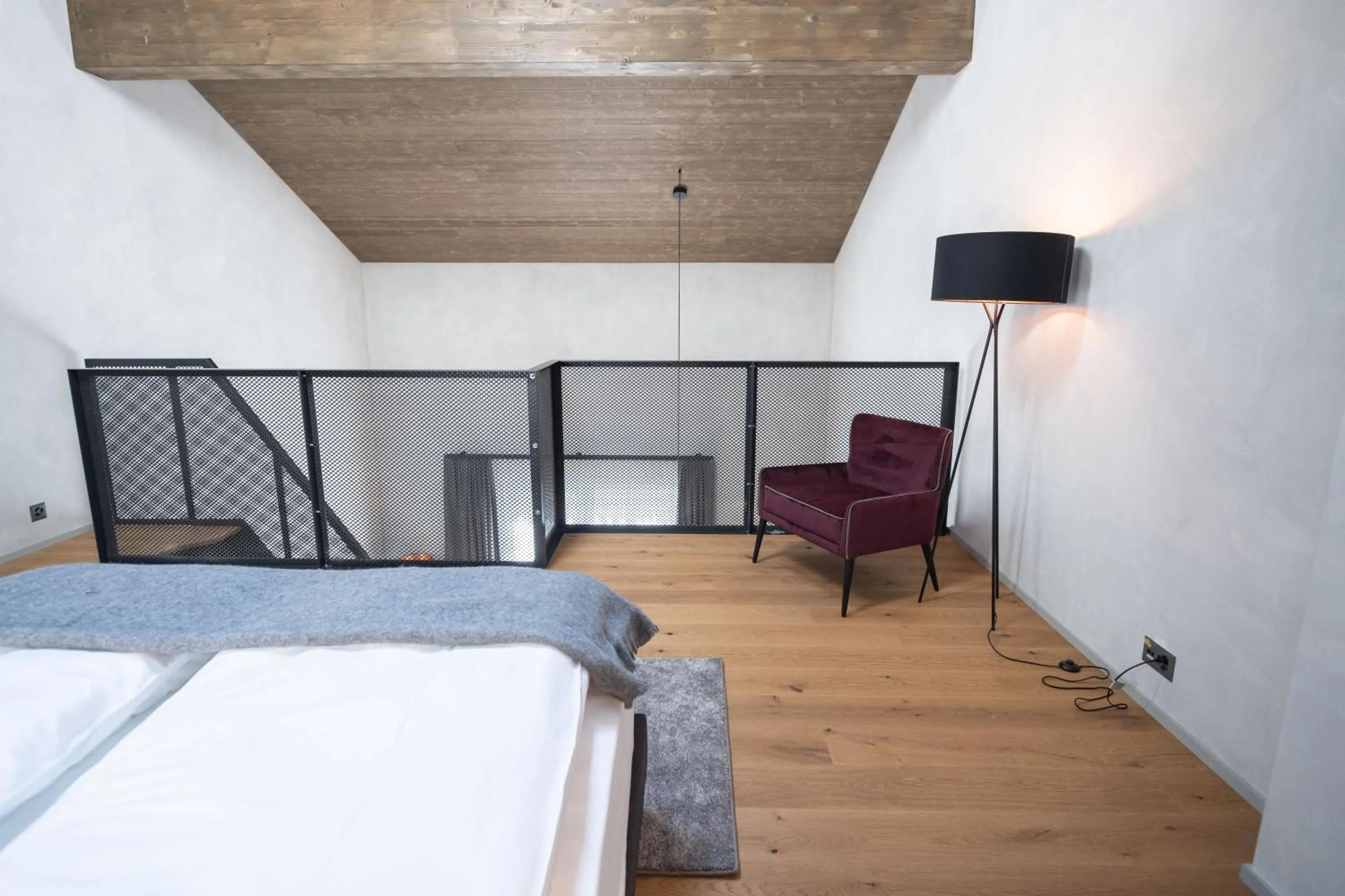 Bed in Andermatt Alpine Apartments