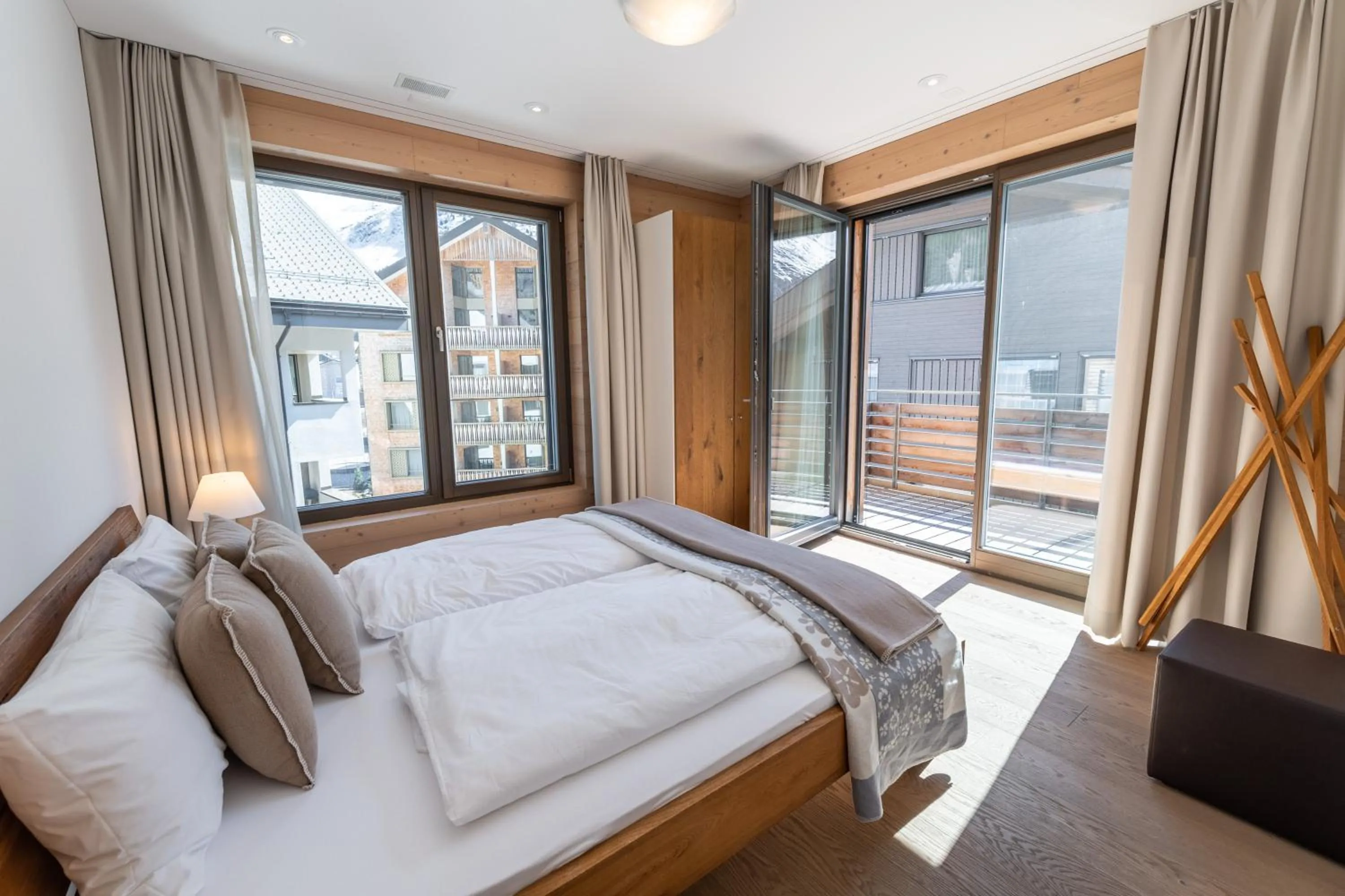 Bedroom, Bed in Andermatt Alpine Apartments