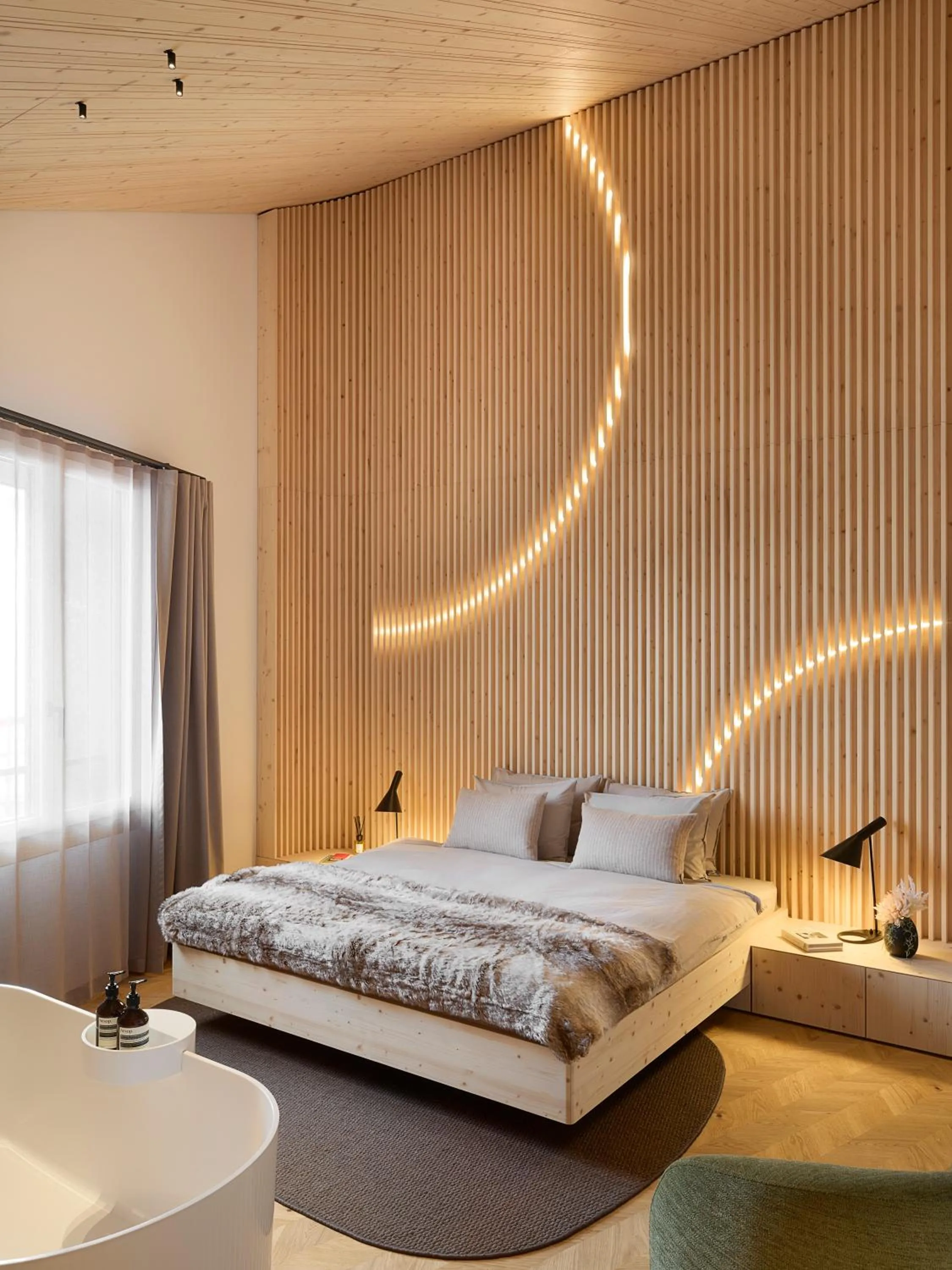 Bed in Andermatt Alpine Apartments