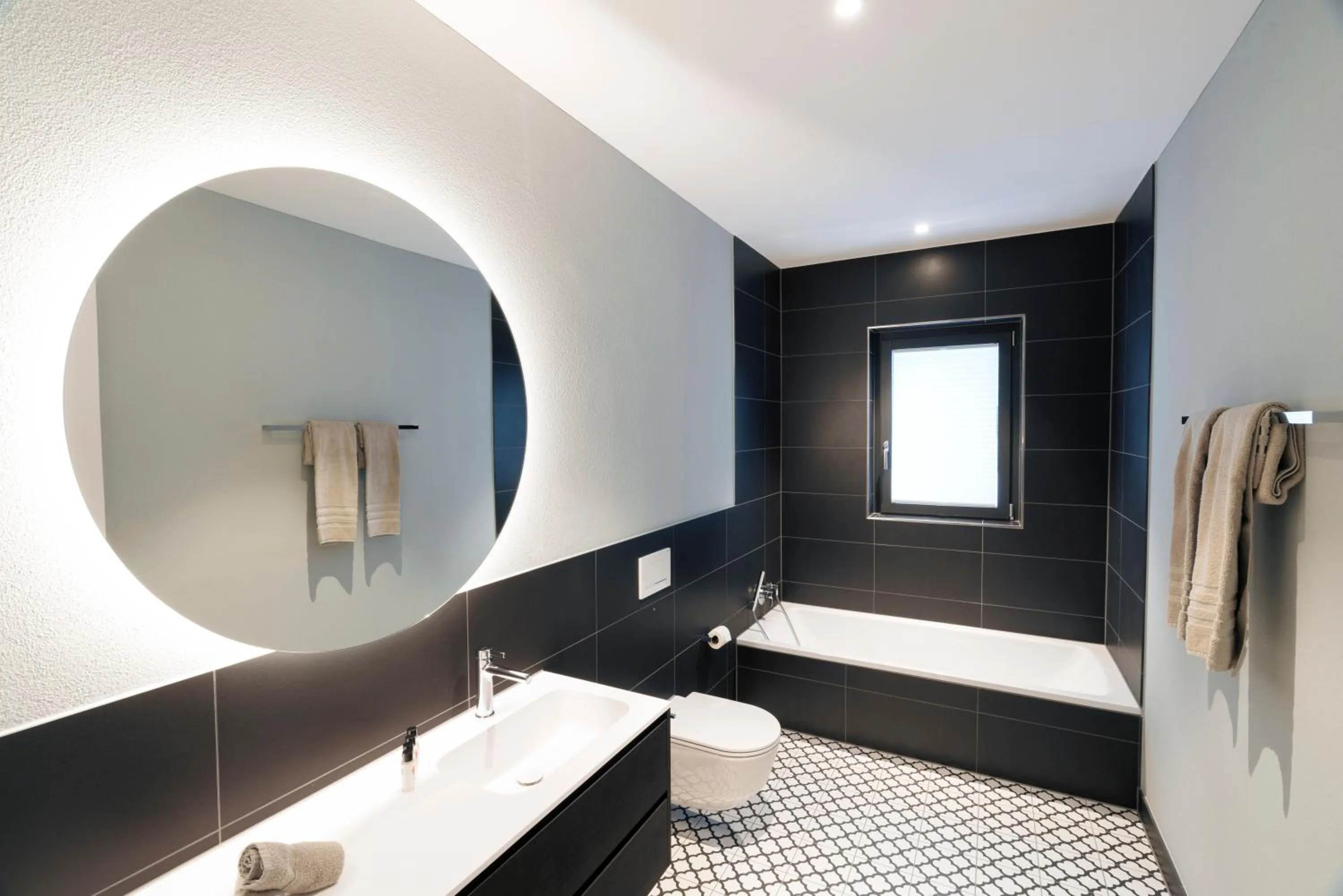 Bathroom, Bed in Andermatt Alpine Apartments
